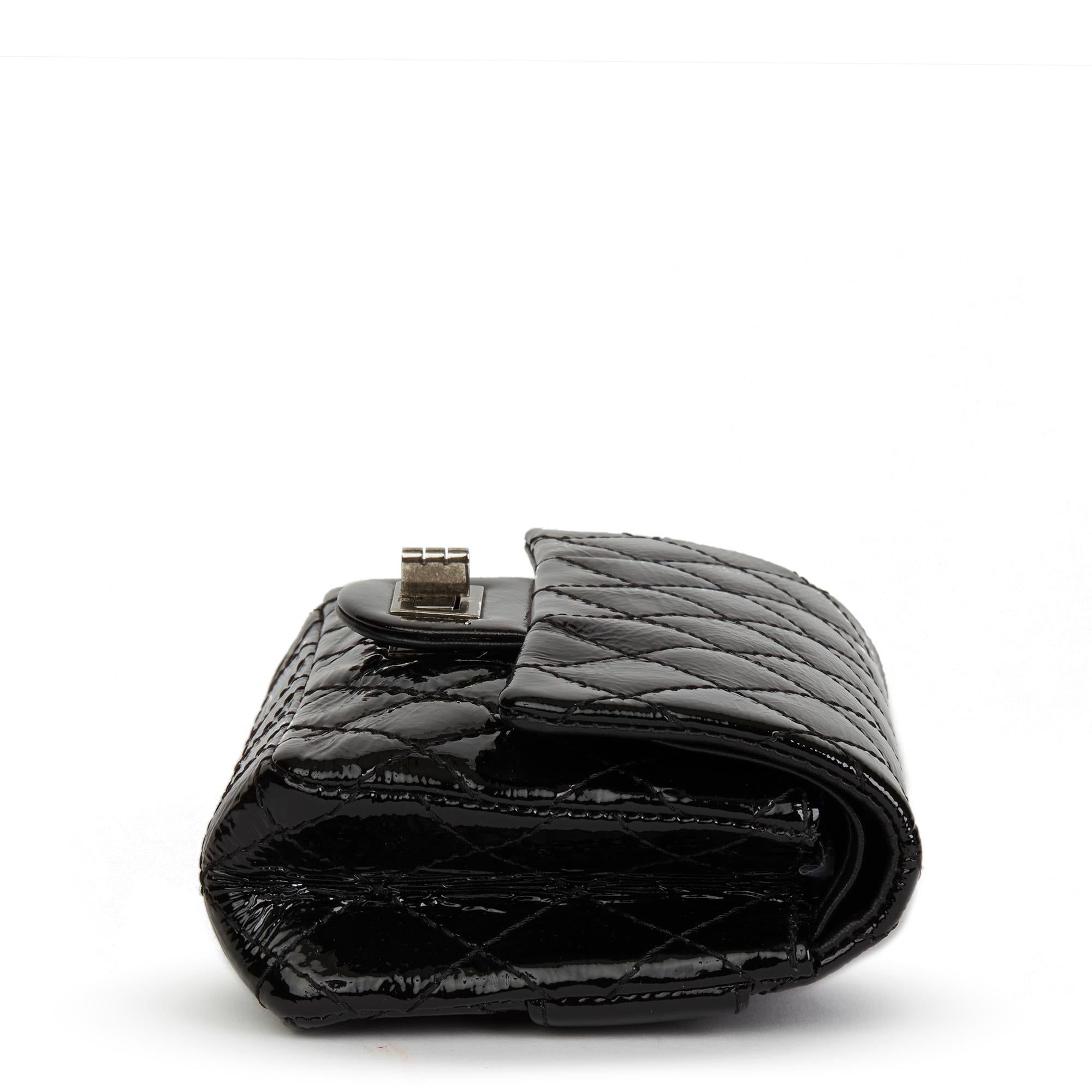 CHANEL
Black Quilted Aged Patent Leather 2.55 Reissue Clutch

Reference: HB2469
Serial Number: 11265851
Age (Circa): 2007
Accompanied By: Chanel Dust Bag, Box
Authenticity Details: Serial Sticker (Made in France)
Gender: Ladies
Type: Clutch

Colour: