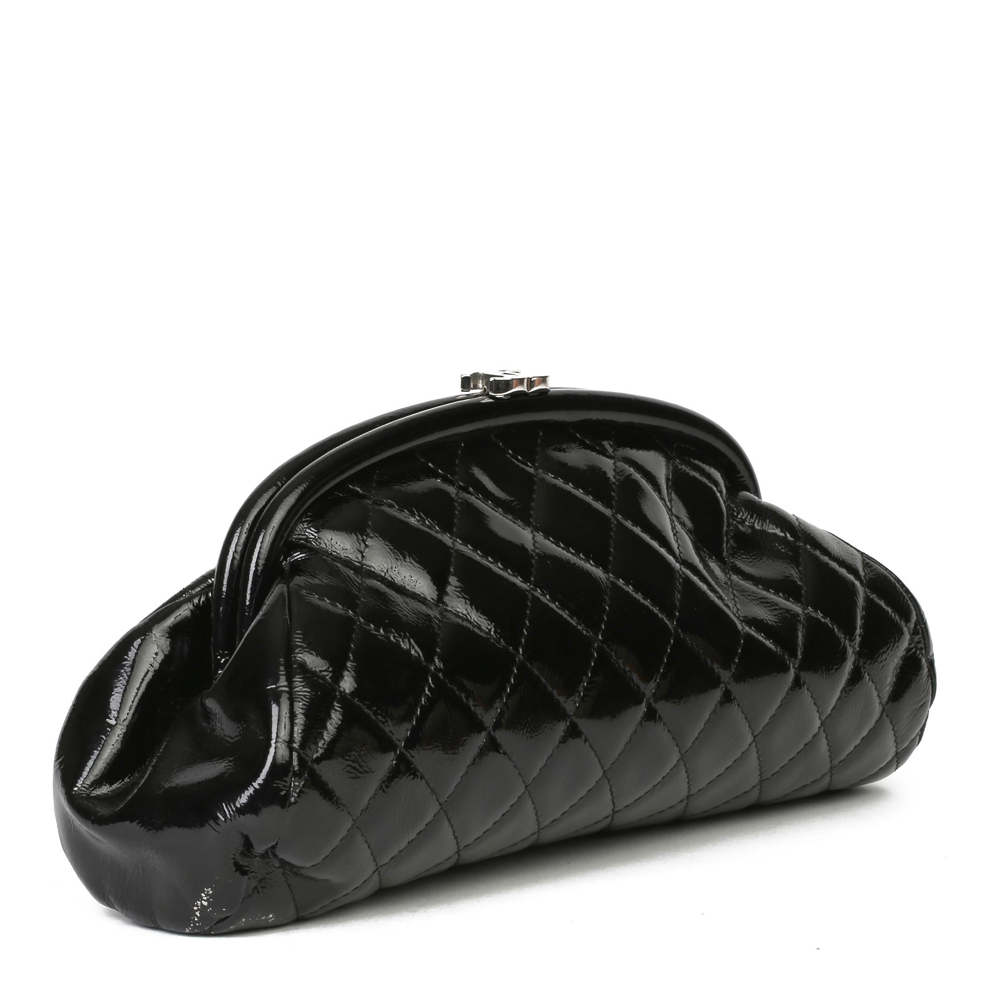 CHANEL
Black Quilted Aged Patent Leather Timeless Clutch

Xupes Reference: HB3916
Serial Number: 11057294
Age (Circa): 2007
Accompanied By: Chanel Dust Bag, Authenticity Card
Authenticity Details: Authenticity Card, Serial Sticker (Made in