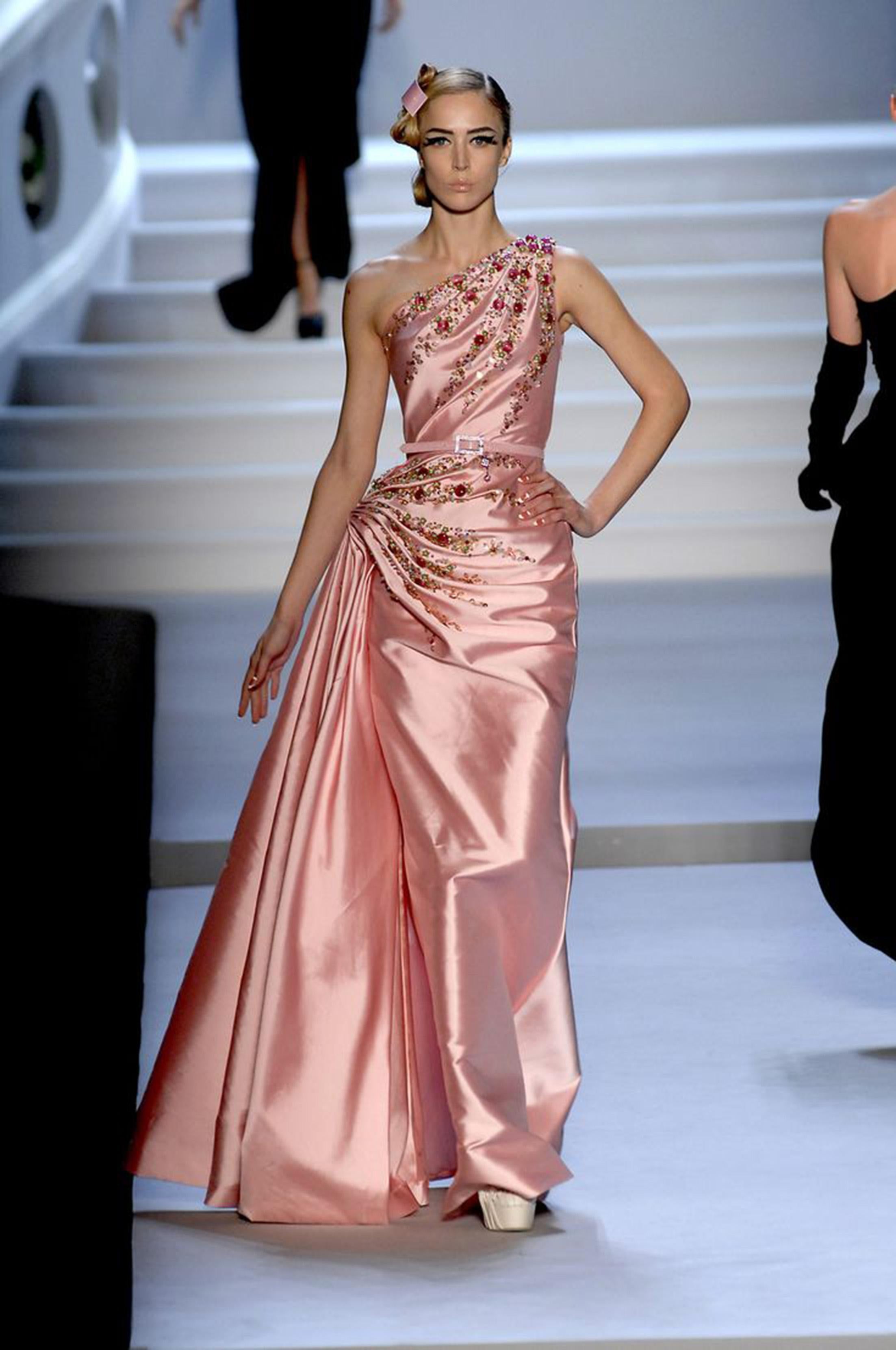 An incredibly special, well-documented Christian Dior blush pink silk sculptural  one-shoulder gown dating back to John Galliano's highly acclaimed 2007 fall-winter collection. This beautiful dress was runway look number 46 modeled by the stunning