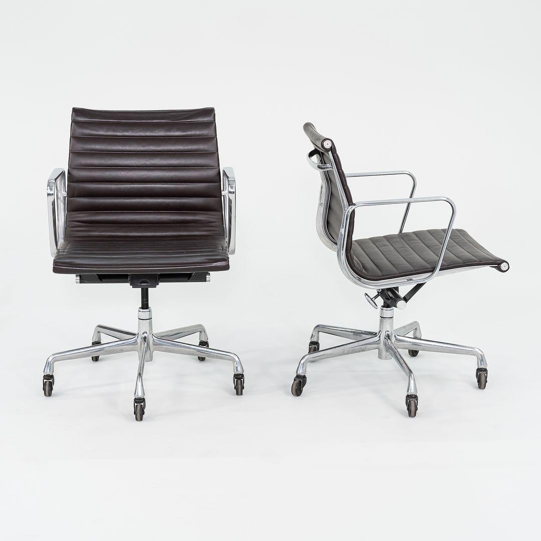 This is an Eames Aluminum Group Management Desk Chair, model EA335, initially designed by Ray and Charles Eames for Herman Miller in 1958. These examples date to 2012. The listed price includes one chair, and we have several chairs available for