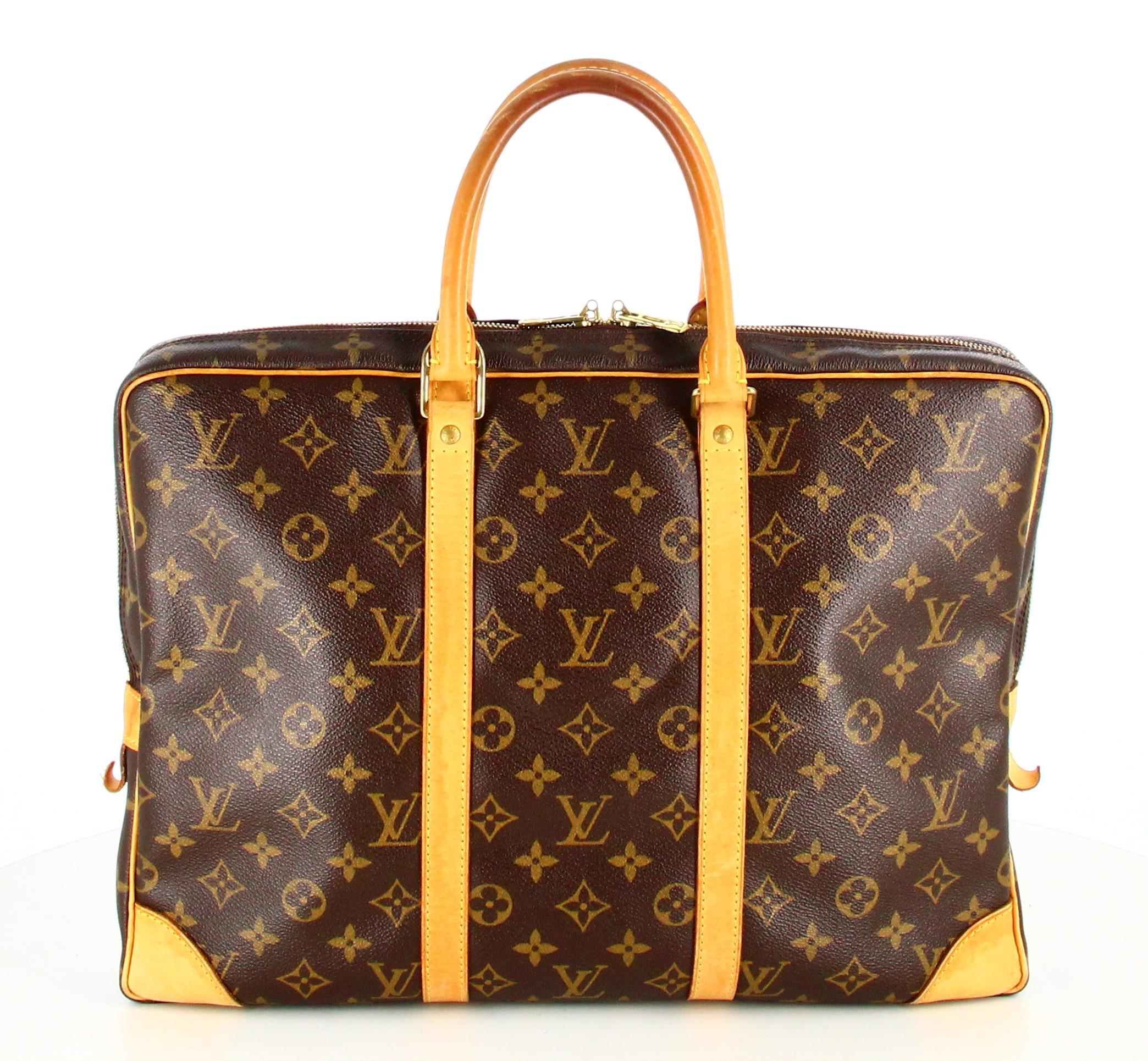 2007 Louis Vuitton Canvas Monogram Travel Document Case

- Very good condition. Shows very slight signs of wear over time. 
- Louis vuitton briefcase 
- Monogram canvas 
- Two brown leather straps 
- Clasp: golden zip
- Inside: several pockets