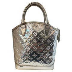 2007 Louis Vuitton limited edition silver monogram miroir lock it pm bag