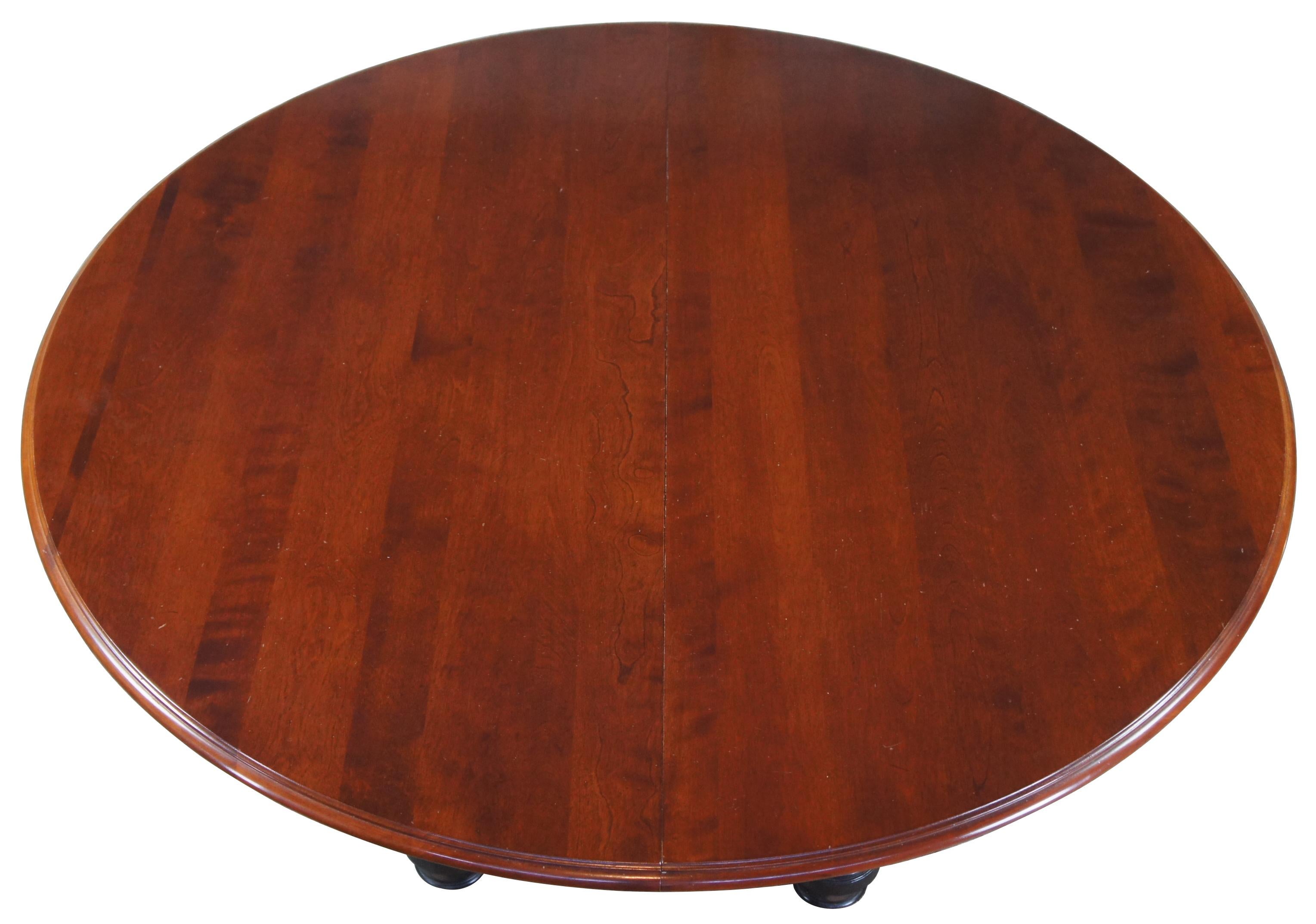 Vintage 2007 Nichols & Stone Antiguan pedestal breakfast or dining table. The romance of the British and West Indies is captured in this stunning pedestal table with hints of exotic origins in the reeded base. The addition of one 18” aproned leaf