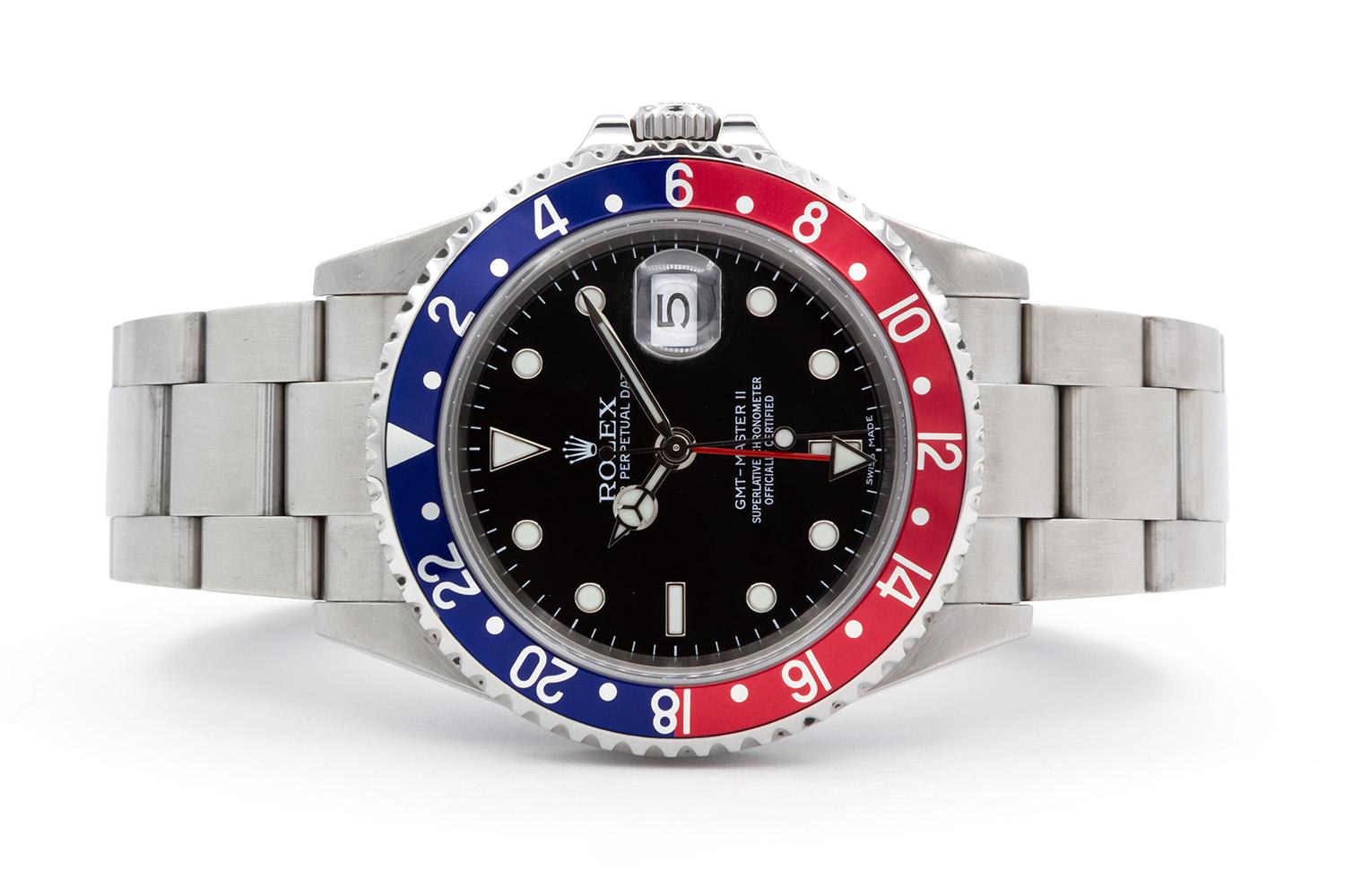 We are pleased to offer this excellent condition 2007 Rolex GMT Master II 16710 “Pepsi”. This watch features a 40mm stainless steel case, Rolex original metal blue & red 24 hour bi-directional bezel, original black dial and original stainless steel