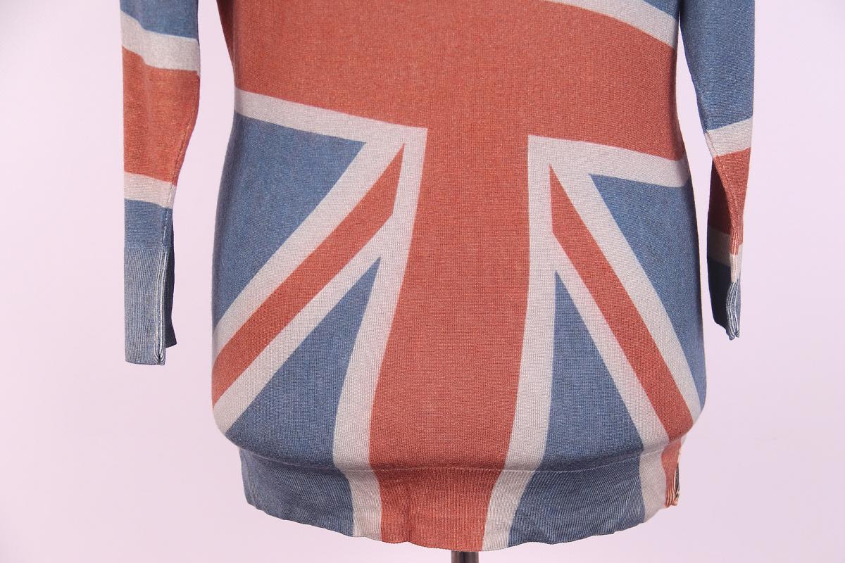 Description
- Alexander McQueen Heritage Graphic Sweater 
- Fall 2008 'The Girl Who Lived in the Tree' Collection
- Print seen on the runway 
- Silk / cashmere
- Featuring Queen Elizabeth II & Union Jack 
- A rare piece from the 2008 collection