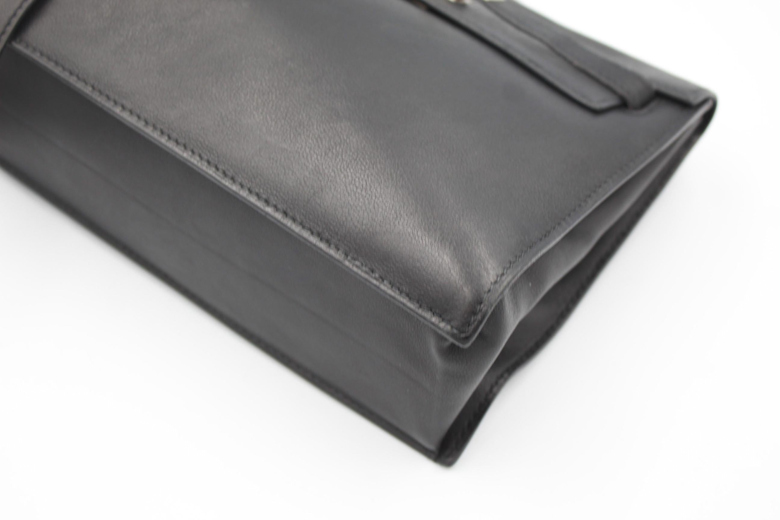 2008 Black Hermes Kelly Danse, one of the most practical hermes bags as it can be worn shoudler, as waist bag or backpack. 
Swift super soft leather. Really good condition. 
Stamp L in a square