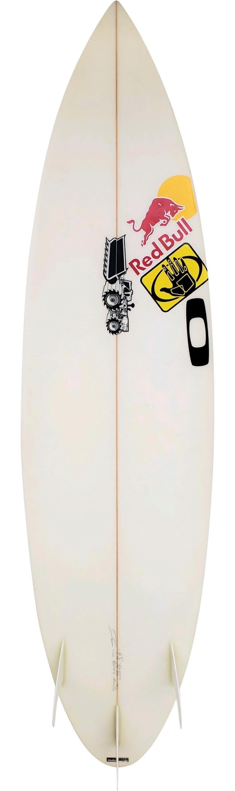 Bruce Iron's personal surfboard shaped under the JS label. This shortboard was made for the professional surfer Bruce Irons. Signed and dated 2008 by the legendary surfer known for his radical aerial maneuvers and fearless barrel riding abilities.