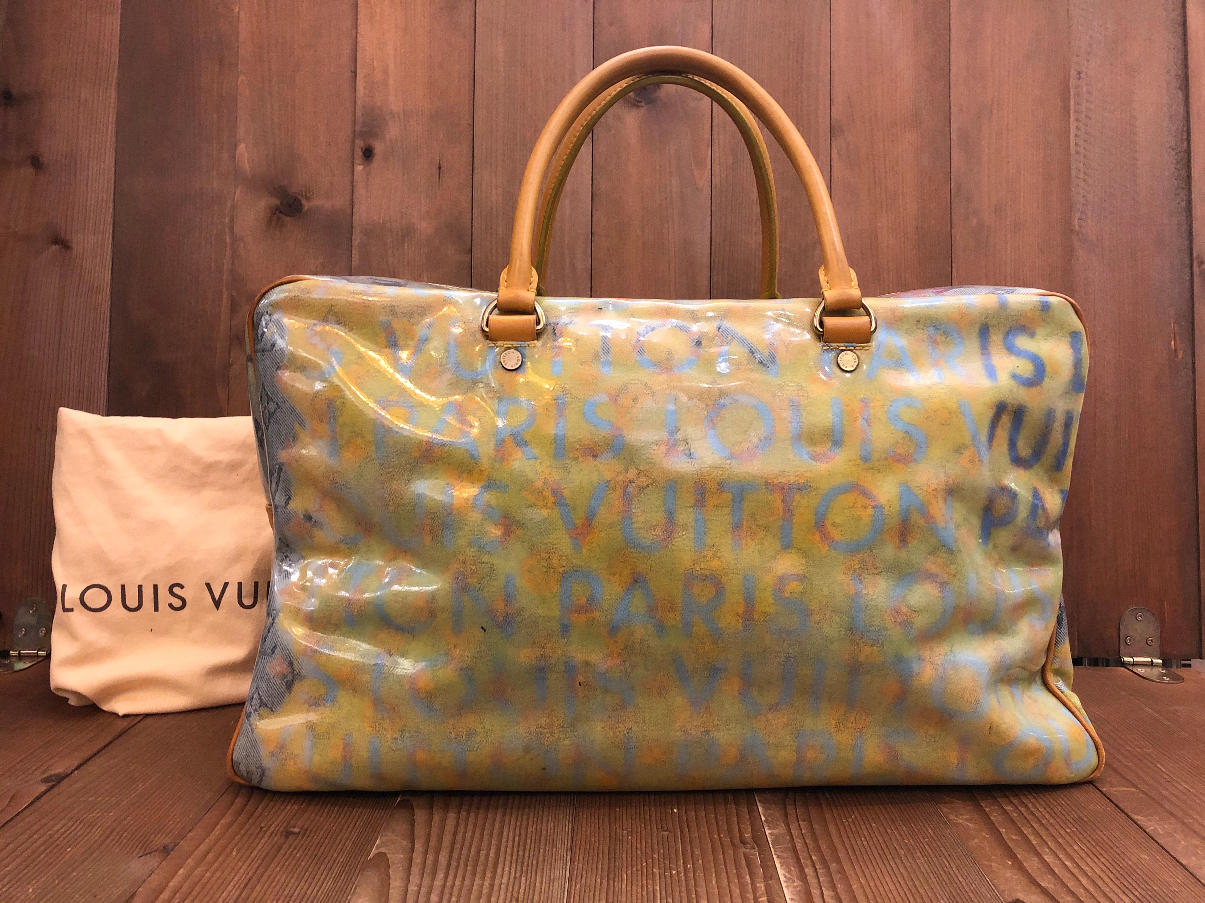 The Louis Vuitton Boston bag is crafted of stonewashed monogram denim canvas and splashed with beautiful watercolor LV monogram artwork designed by renown artist Richard Prince and coated with transparent vinyl making it repellent to water. This
