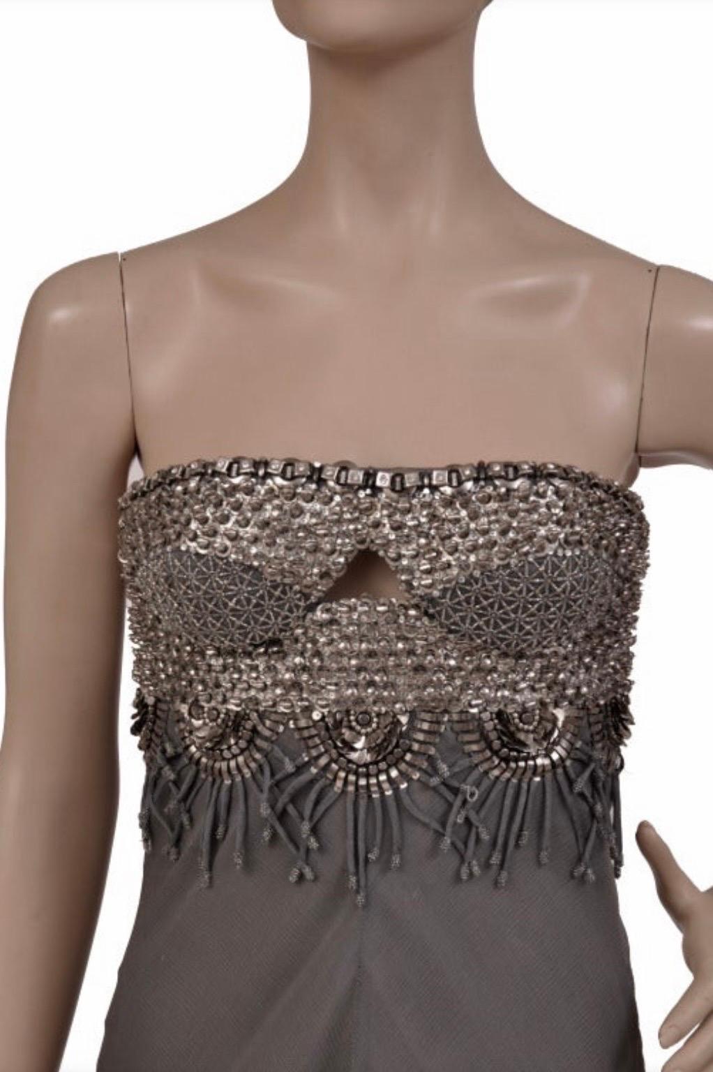 2008 VINTAGE VERSACE SWAROVSKI AND METAL EMBROIDERY DRESS
Strapless design, artfully embellished body and chiffon skirt - ensure a stunning silhouette.
IT Size 40 or US 4
Made in Italy
Retail price is $13,105.00

Please note that the dress comes