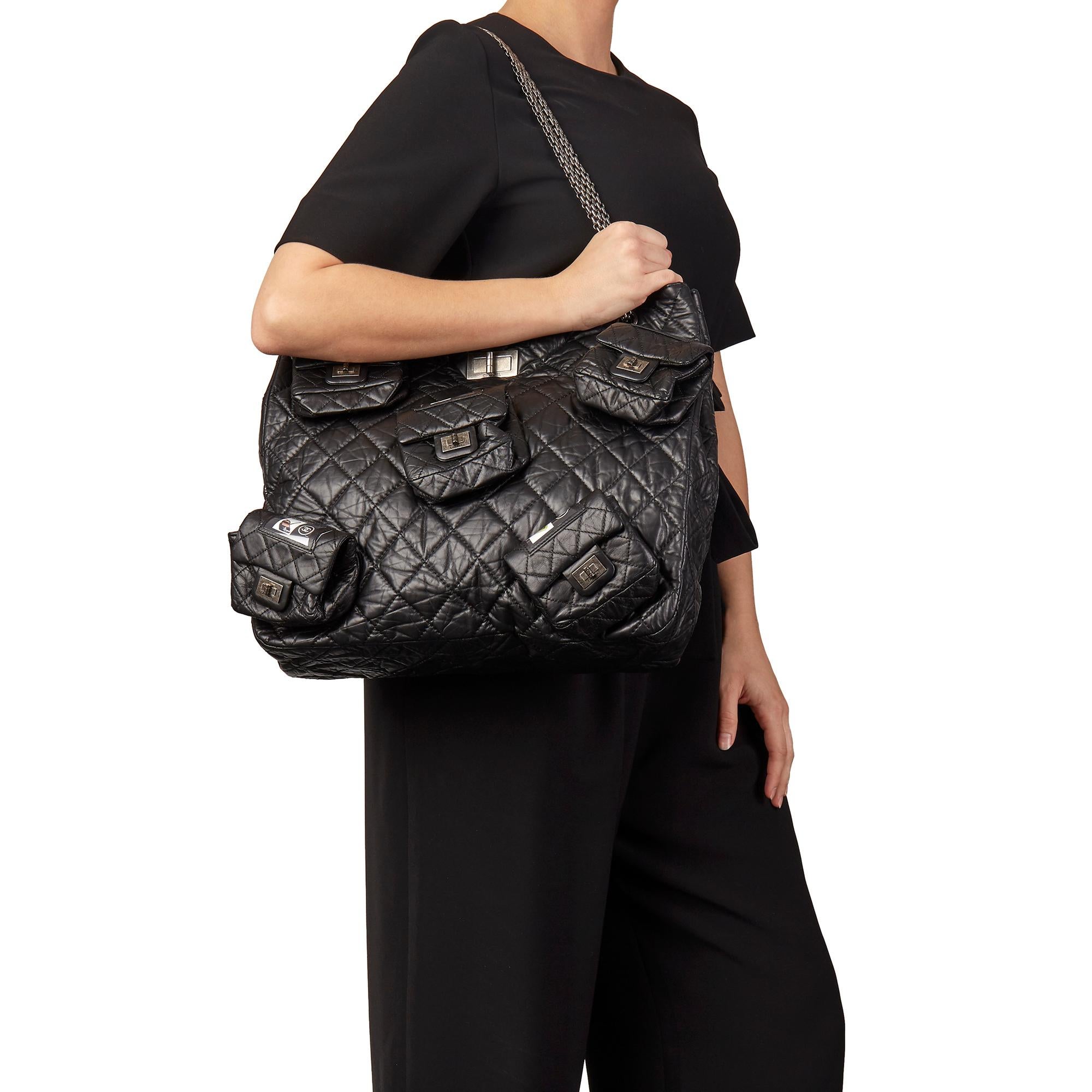 CHANEL
Black Quilted Aged Calfskin Leather 5 Pocket Reissue Shoulder Bag 

Xupes Reference: HB3163
Serial Number: 12293824
Age (Circa): 2009
Accompanied By: Authenticity Card, Removable Pocket Pocket References
Authenticity Details: Serial Sticker,
