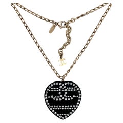 Vintage 2009 Chanel Black Resin Clear Crystal CC Logo Heart Pendant Chain Necklace