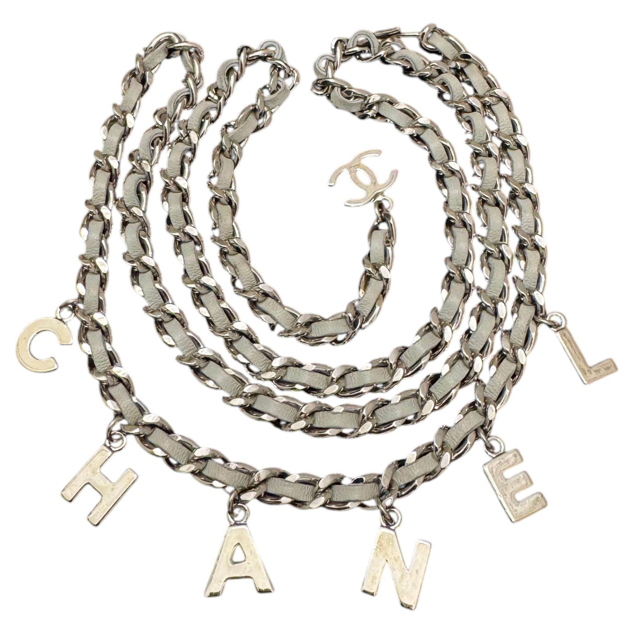 2009 CHANEL Silver Toned Letter Leather Chain Belt Grey