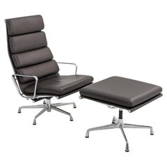 2009 Herman Miller Silla Eames Soft Pad Lounge y Otomana de piel marrón EA438