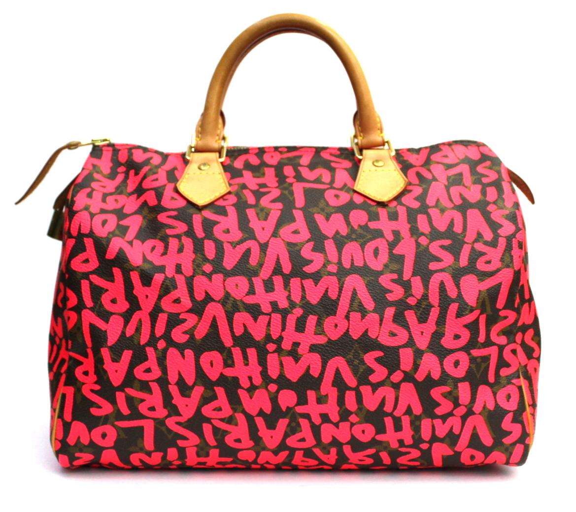 This limited edition Louis Vuitton Graffiti Sprouse Speedy 30 presents the monogram canvas with the iconic pattern covered with fluorescent graffiti. The Speedy was designed after the iconic Keepall and has always been popular. With its