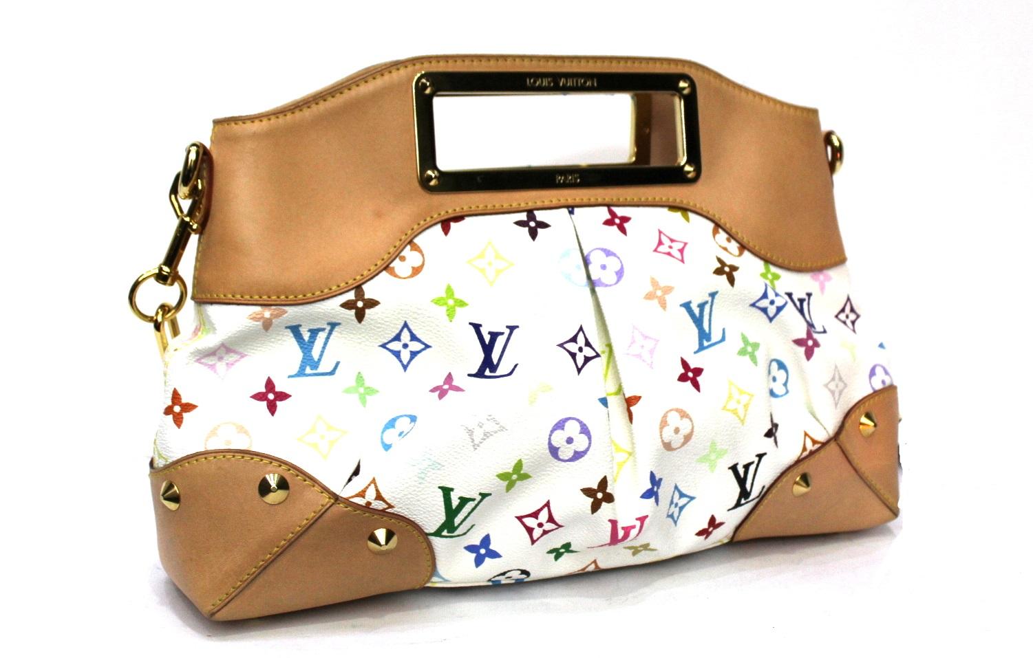 Louis Vuitton Judy model multicolor pattern and golden hardware.

Possibility to wear it either by hand or on the shoulder. Very good condition.