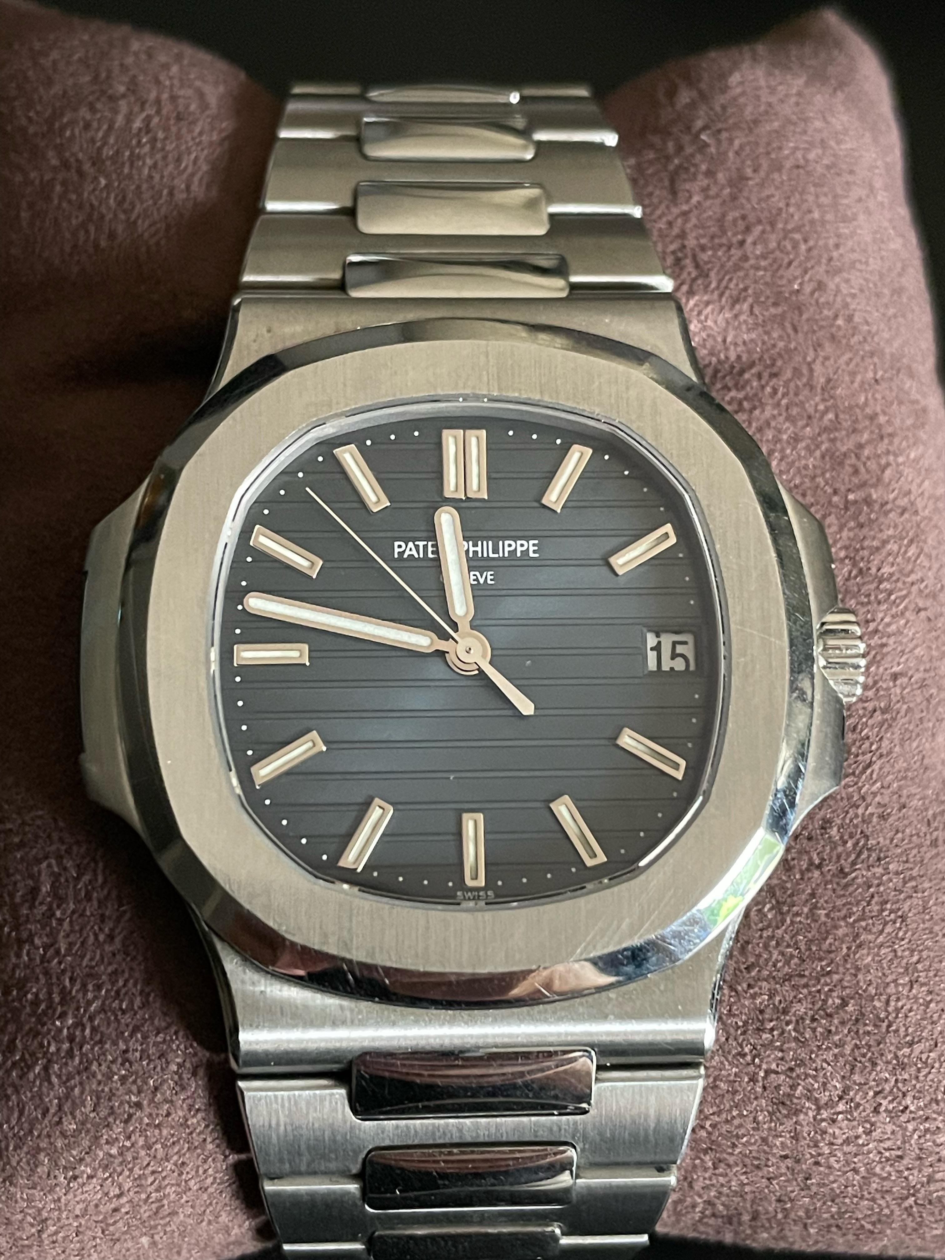 Amazing and iconic Patek Philippe Nautilus
Steel
Movement: automatic
Function: hours, minutes, seconds, date
Case: 38.4mm stainless steel round case,  sapphire crystal
Band: stainless steel Patek Philippe Nautilus bracelet
Reference: 5711/1A