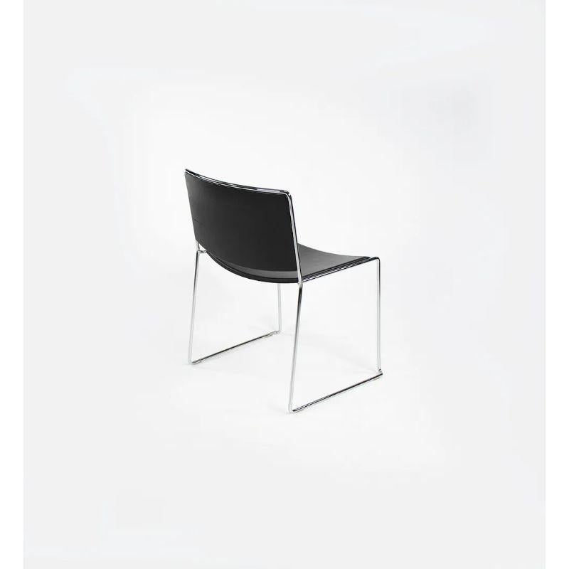 This is a ‘Spindle’ Side Chair, model 1526, designed by Piero Lissoni for Porro Italia in 1999. The listed price includes one chair, and we have several available for purchase. These particular examples date to 2009. Their design features a