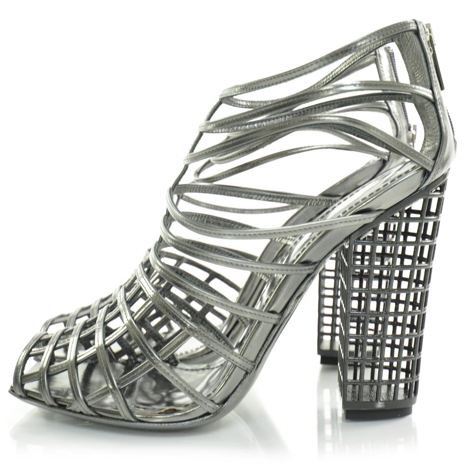 The Cage Boots walked the Saint Laurent runway for the fashion house's Spring 2009 runway. Designed when Stefano Pilati was the creative director, these designs were instantly iconic and featured in numerous editorial shoots across the fashion