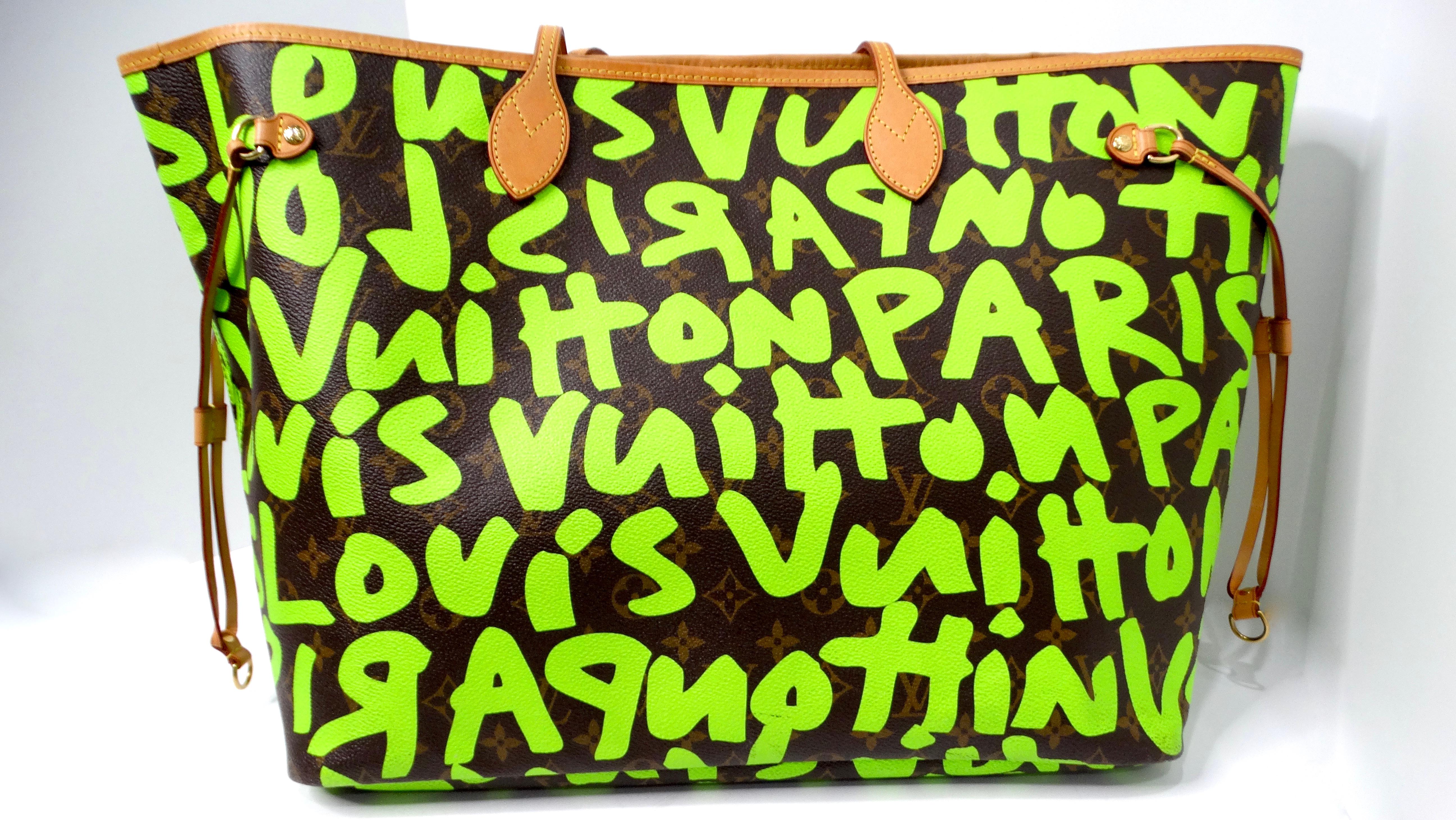The 2009 Stephen Sprouse for Louis Vuitton Monogram Graffiti Neon Neverfull Tote Bag is a striking fusion of luxury and street art. This iconic piece features vibrant neon graffiti on the classic Louis Vuitton monogram canvas, making it a standout