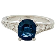 2.00ct Cushion Cut Blue Sapphire in a Platinum Band Set with 0.24ct of Diamonds