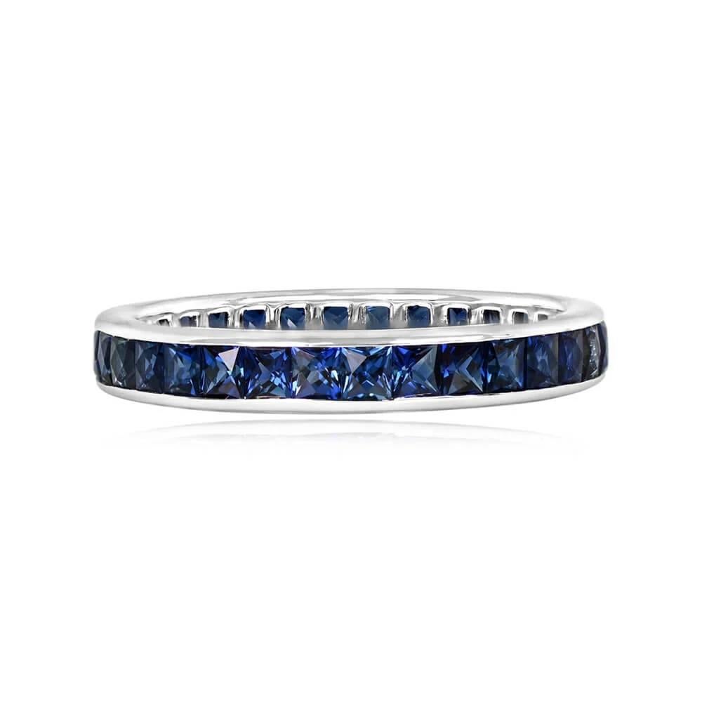 A stunning eternity band featuring approximately 2.00 carats of channel-set French-cut natural sapphires. The handcrafted platinum mounting boasts a simple finish, and the band width measures 3.10mm.

Ring Size: 7 US, Resizable 
Metal: