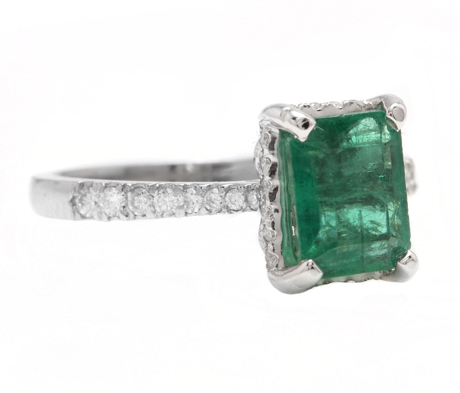 2.00 Carats Natural Emerald and Diamond 14K Solid White Gold Ring

Suggested Replacement Value: Approx. $5,000.00

Total Natural Green Emerald Weight is: Approx. 1.70 Carats (transparent)

Emerald Measures: Approx. 8.00 x 6.00mm

Emerald Treatment: