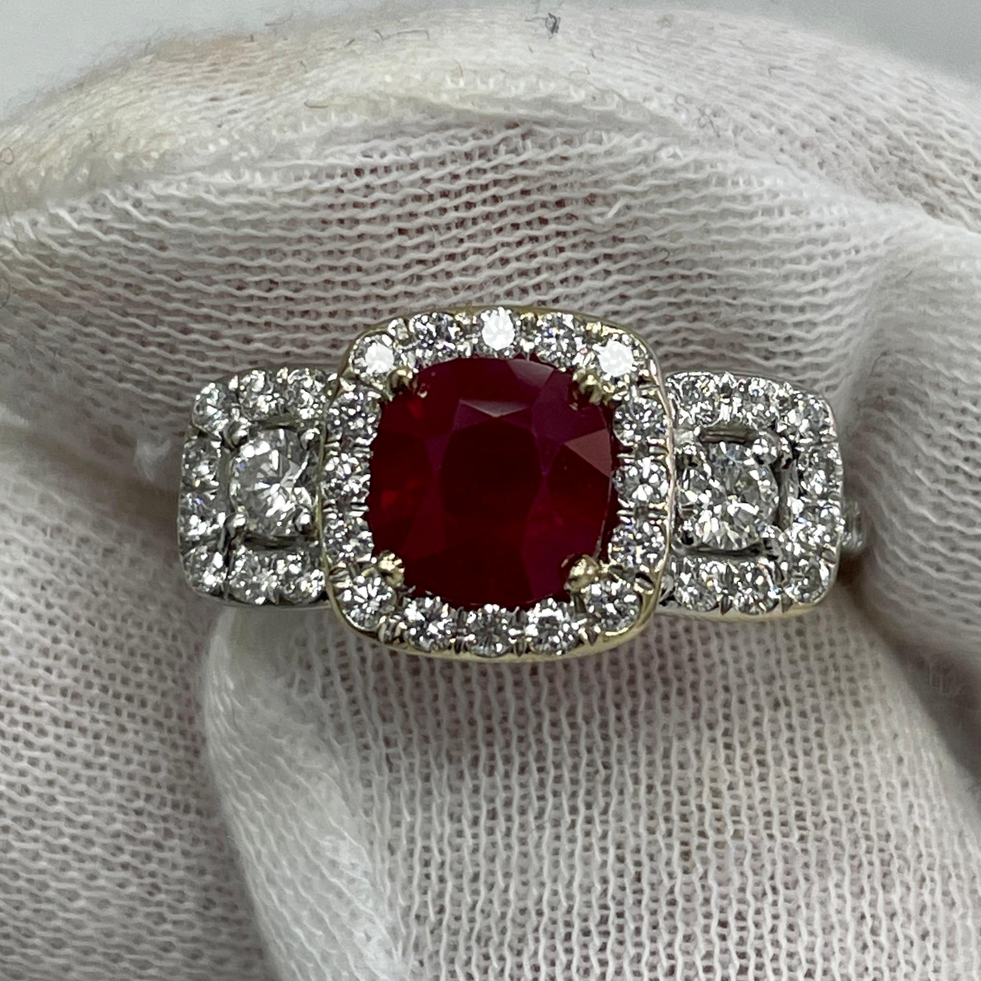 Ce rubis rouge saturé, signe d'arrêt, est monté sur une bague en or blanc 18 carats avec 0,87 carats de diamants blancs brillants.