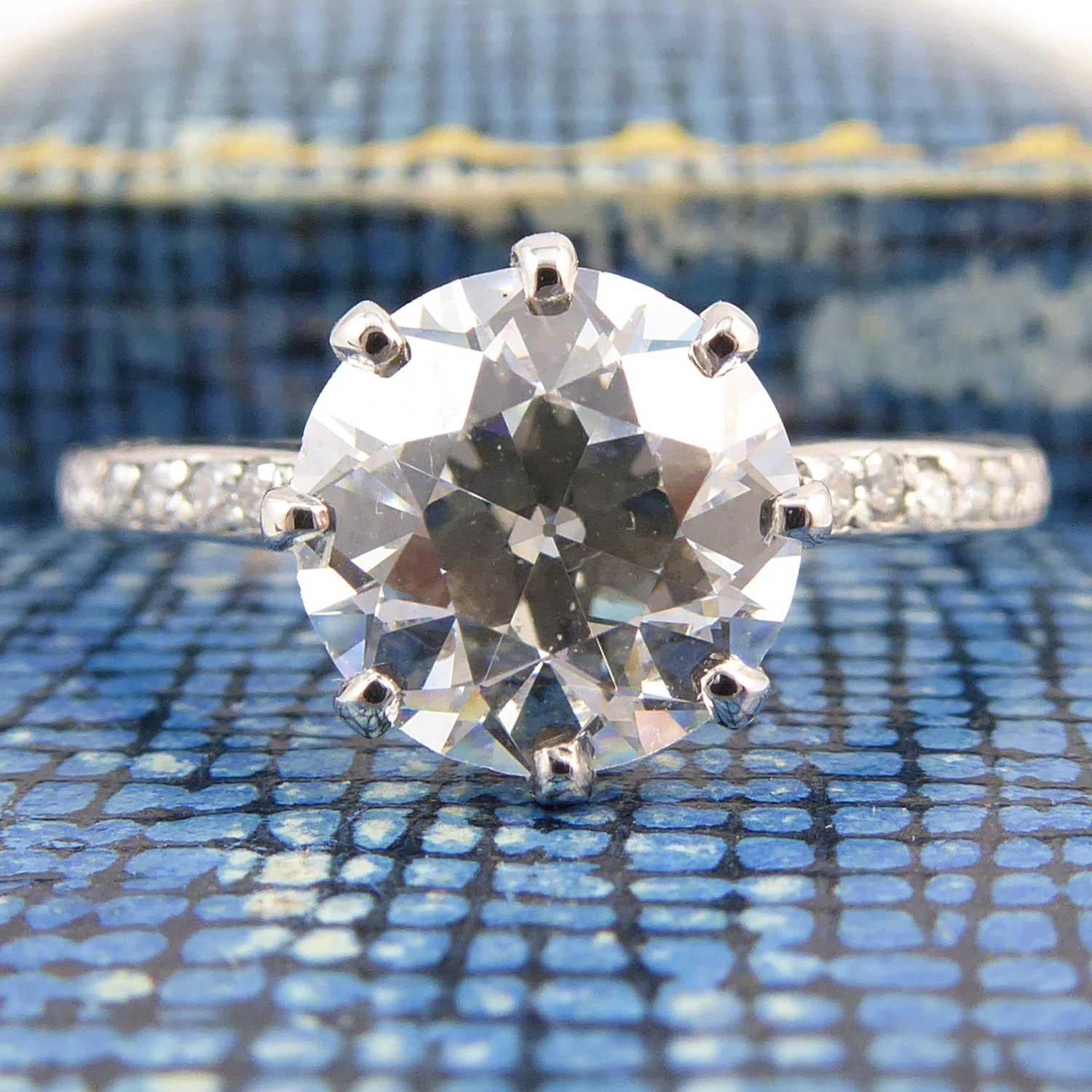 Set with an early brilliant cut diamond, circa 1940's, this diamond solitaire is classic and elegant.  Weighing 2.01ct with colour and clarity assessed as I-J and VS2 the diamond has been reset into a traditional eight claw set mount and is