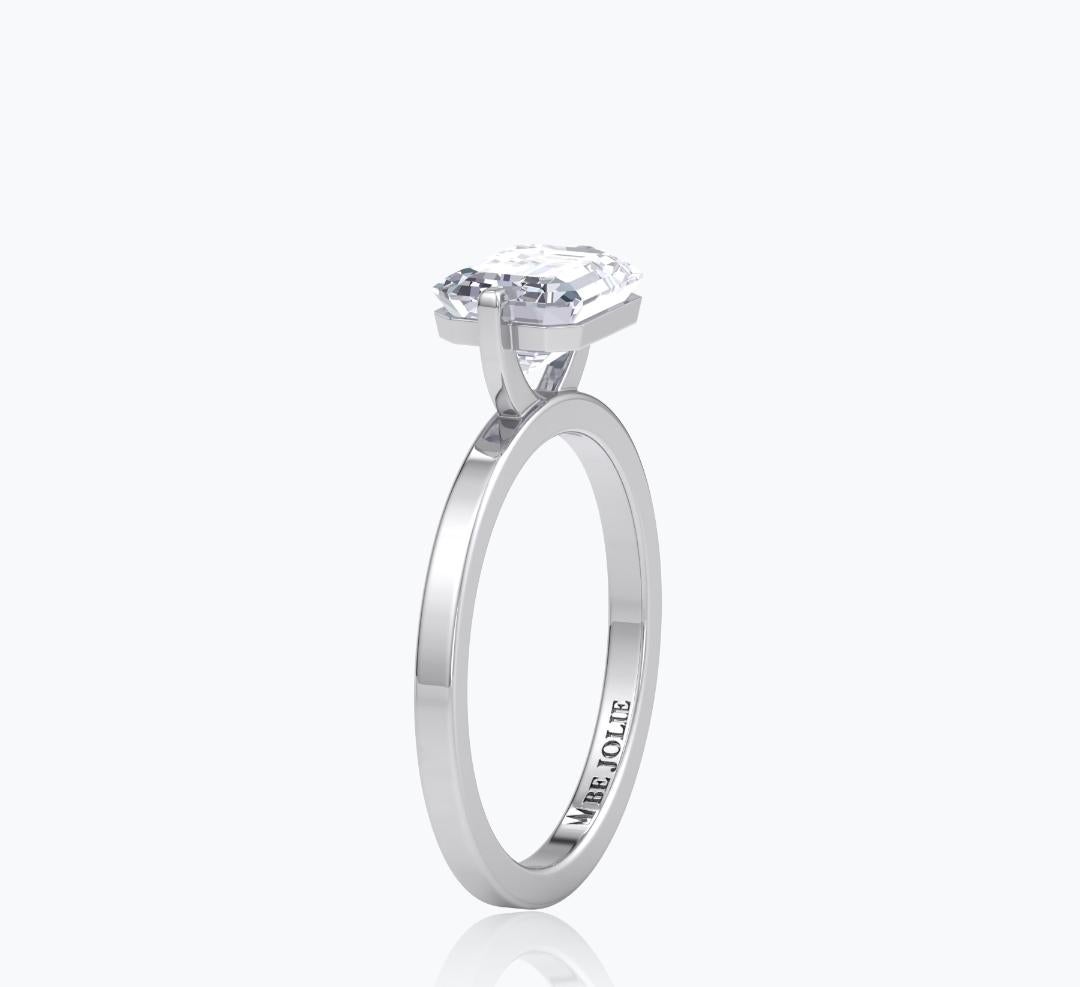 18 carat emerald cut diamond ring