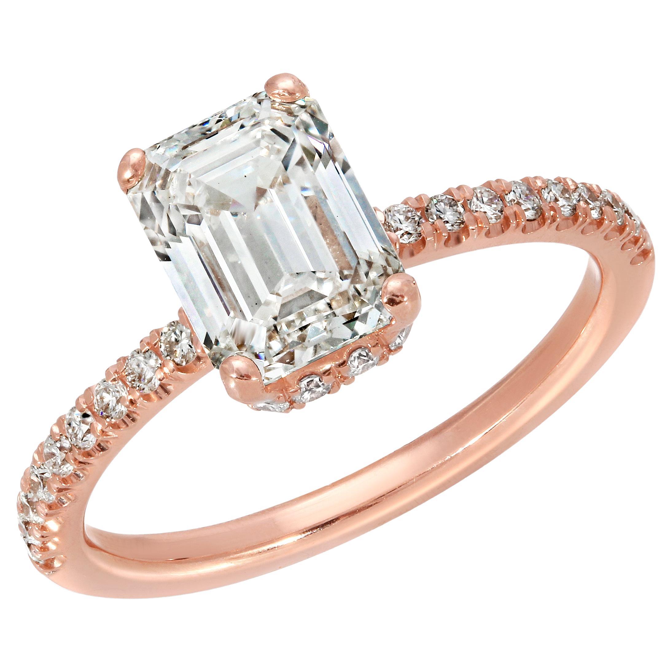 2.01 Carat Emerald Cut Diamond Set in a 14k Rose Gold Halo & Hidden Halo Ring For Sale