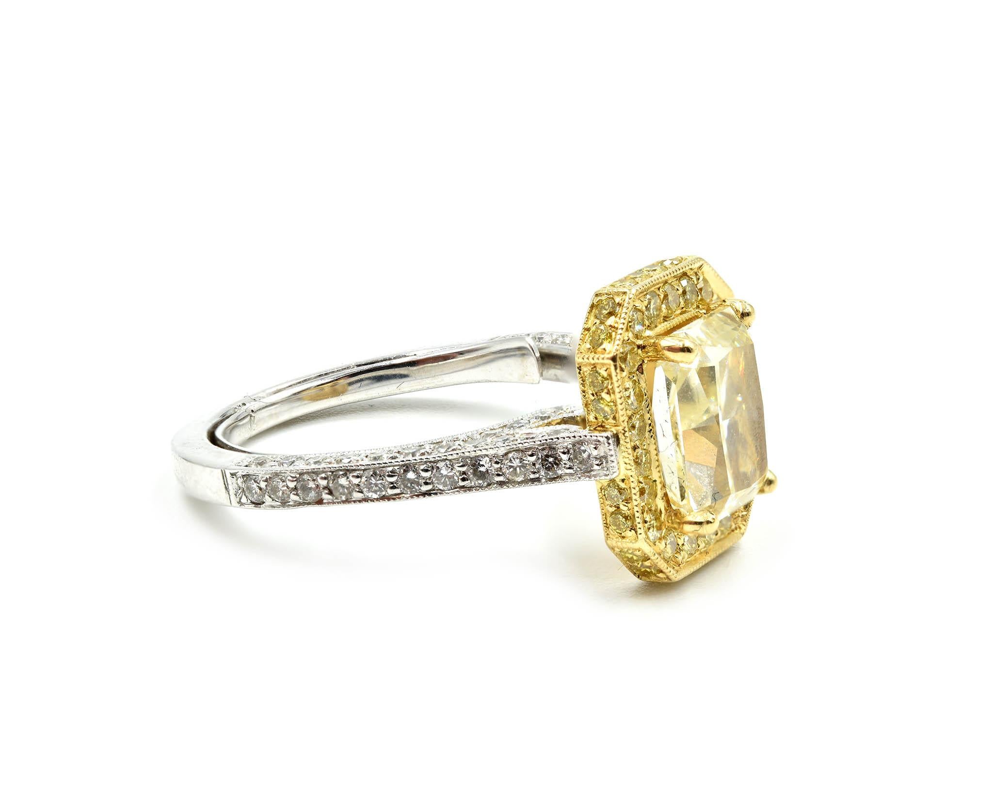 Designer: custom design
Material: 18k white and yellow gold
Center Stone: 2.01 carat fancy light yellow radiant cut diamond
Color: fancy light yellow
Clarity: VS1
Diamonds: 1.09 carat weight
Color: F-H
Clarity: SI1-SI2
Carat Total Weight: 3.10 carat
