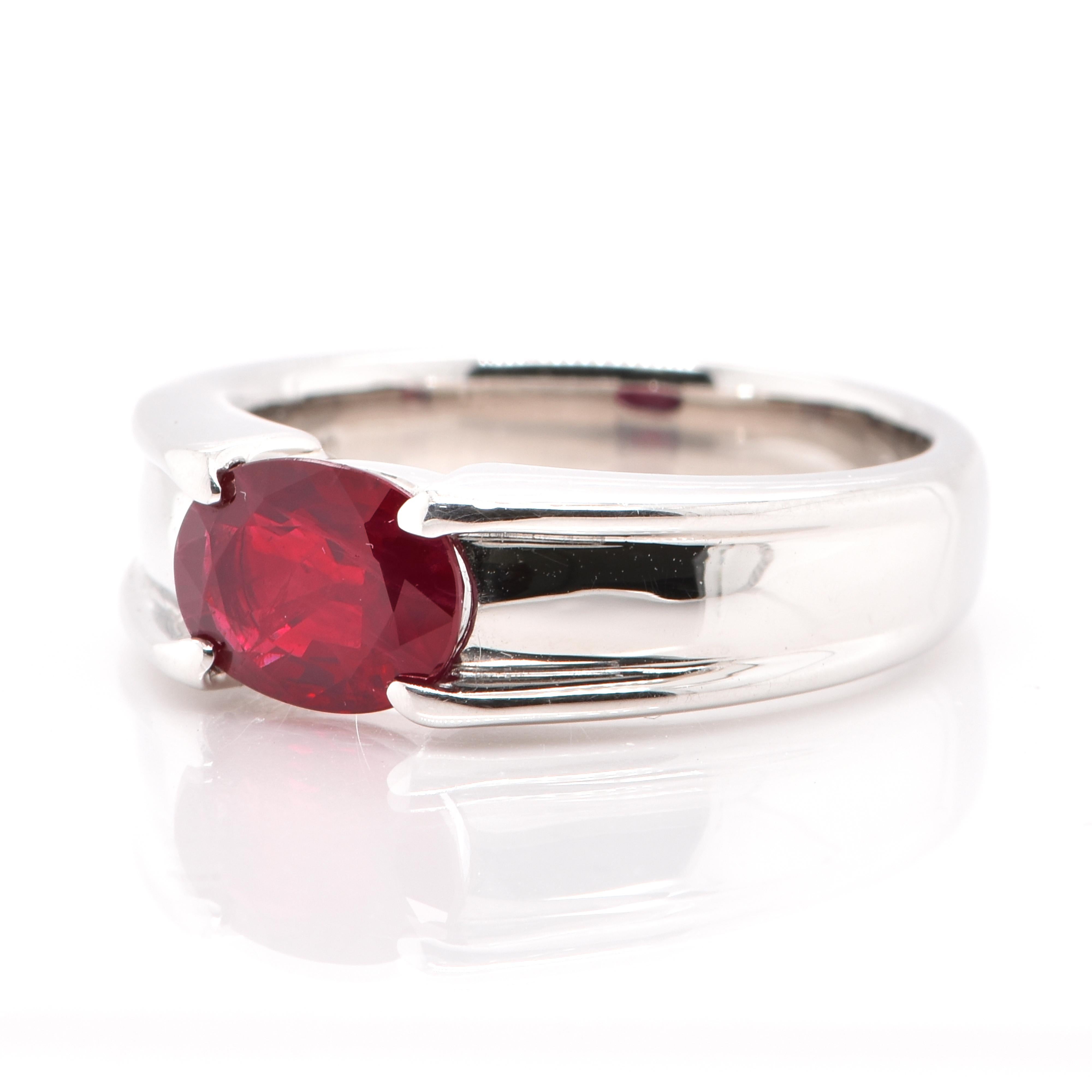 A beautiful Band Ring featuring a GRS Certified 2.01 Carat, Pigeon's Blood Color Ruby set in Platinum. The Ruby exhibits a deep red color known as Pigeon's Blood red. Rubies are referred to as 