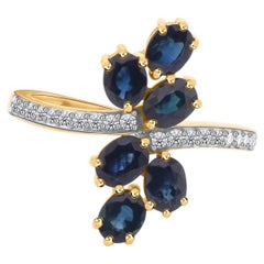 2.01 Carat Oval Blue Sapphire 0.17 Carat SI/H Diamond Ring 14 Karat Yellow Gold