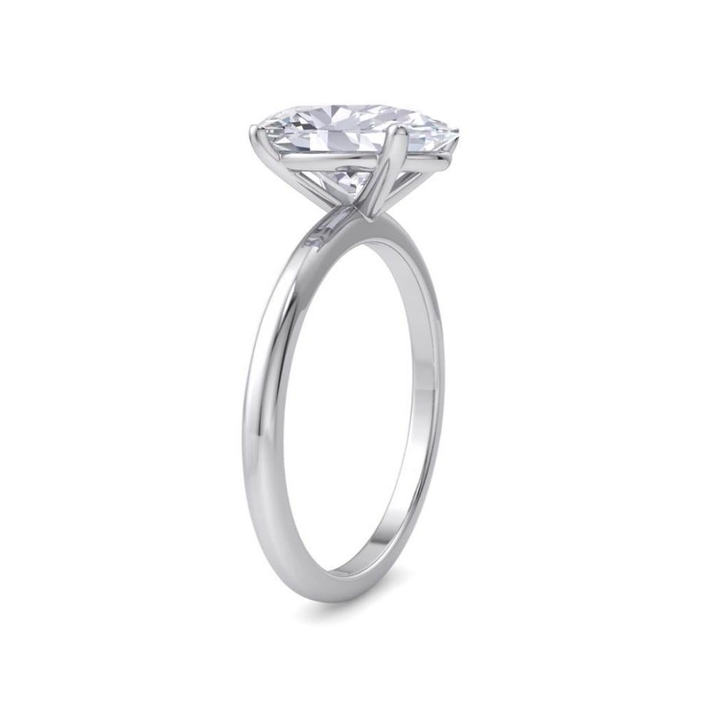 Handcrafted Solitaire Engagement Ring centers a 2.01 Carat oval cut diamond  F-G / SI2 and mounted on 14K White Gold. 
Ring Size 6.5 and can be resized. 
Our ring is custom made. Since beautiful jewels takes time to create, our lead time may take up