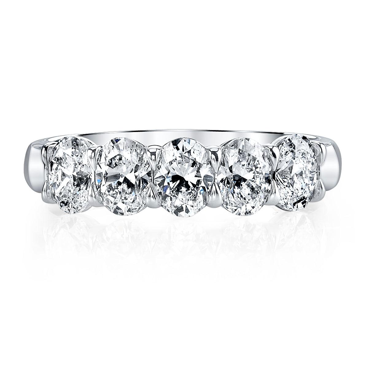 This elegant 5-stone Oval Diamond Cut Eternity Band showcases 5 diamonds, framed by a beautiful buttercup-shaped band crafted in platinum.  

Oval Diamond Cut Eternity Band
Diamonds: 5pcs 2.01ct G/H SI.
Buttercup Band.
Platinum.
Size 6.
