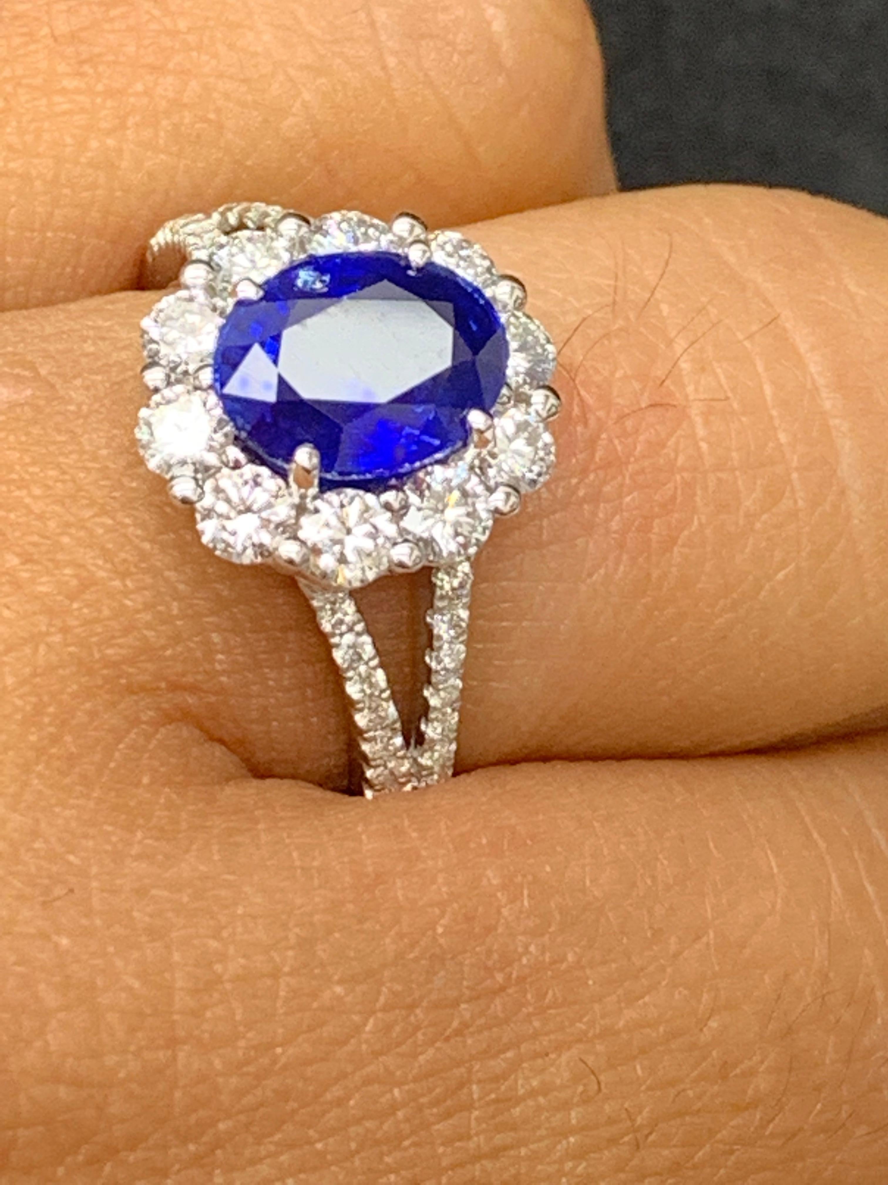 2.01 Carat Oval Shape Blue Sapphire and Diamond Flower Ring in 18K White Gold For Sale 5