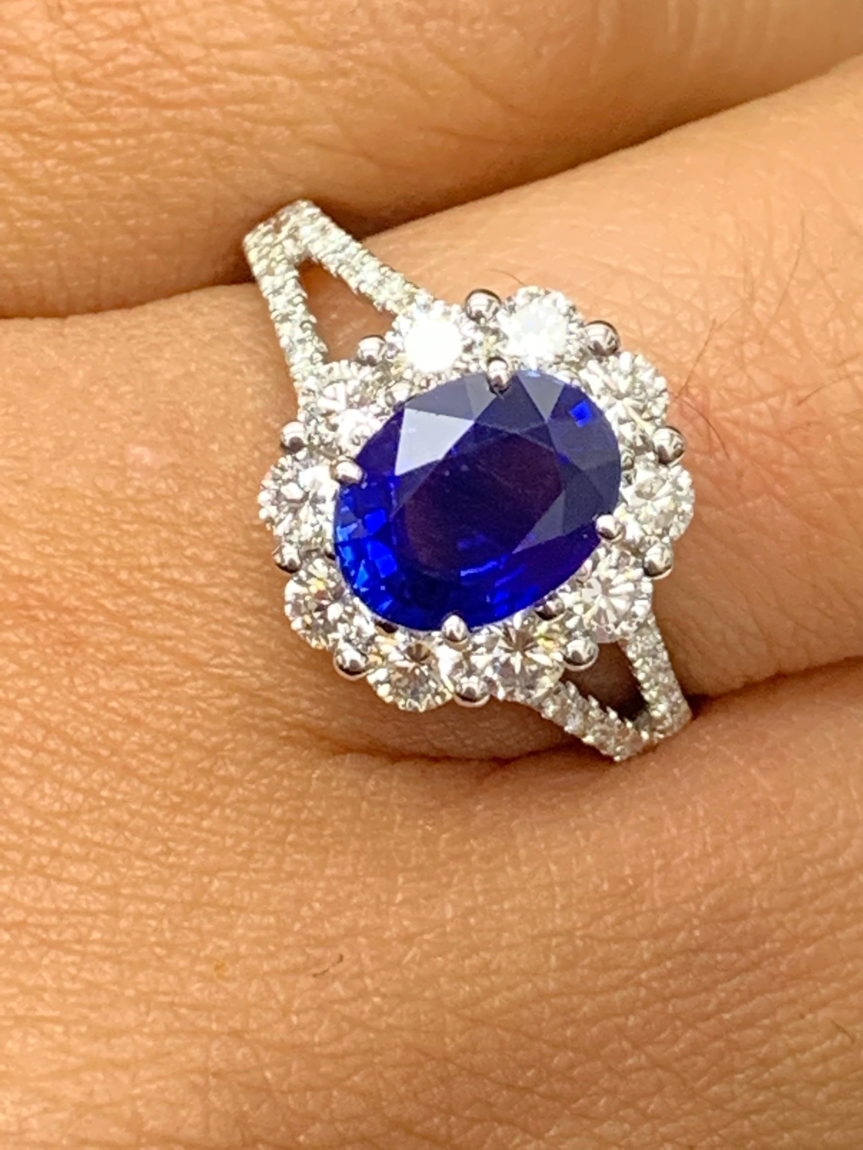 2.01 Carat Oval Shape Blue Sapphire and Diamond Flower Ring in 18K White Gold For Sale 6