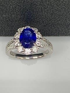 2.01 Carat Oval Shape Blue Sapphire and Diamond Flower Ring in 18K White Gold