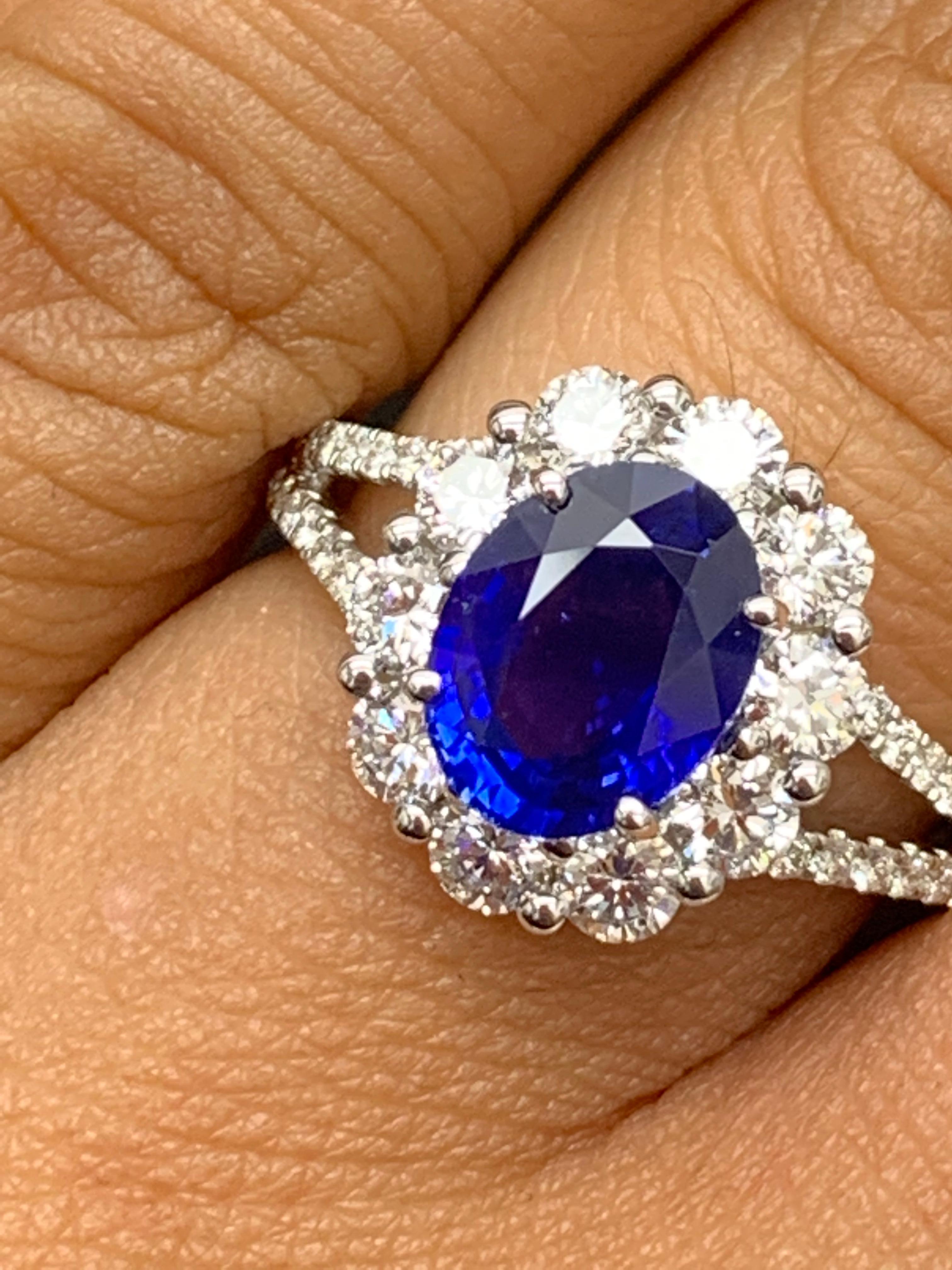 Women's 2.01 Carat Oval Shape Blue Sapphire and Diamond Flower Ring in 18K White Gold For Sale
