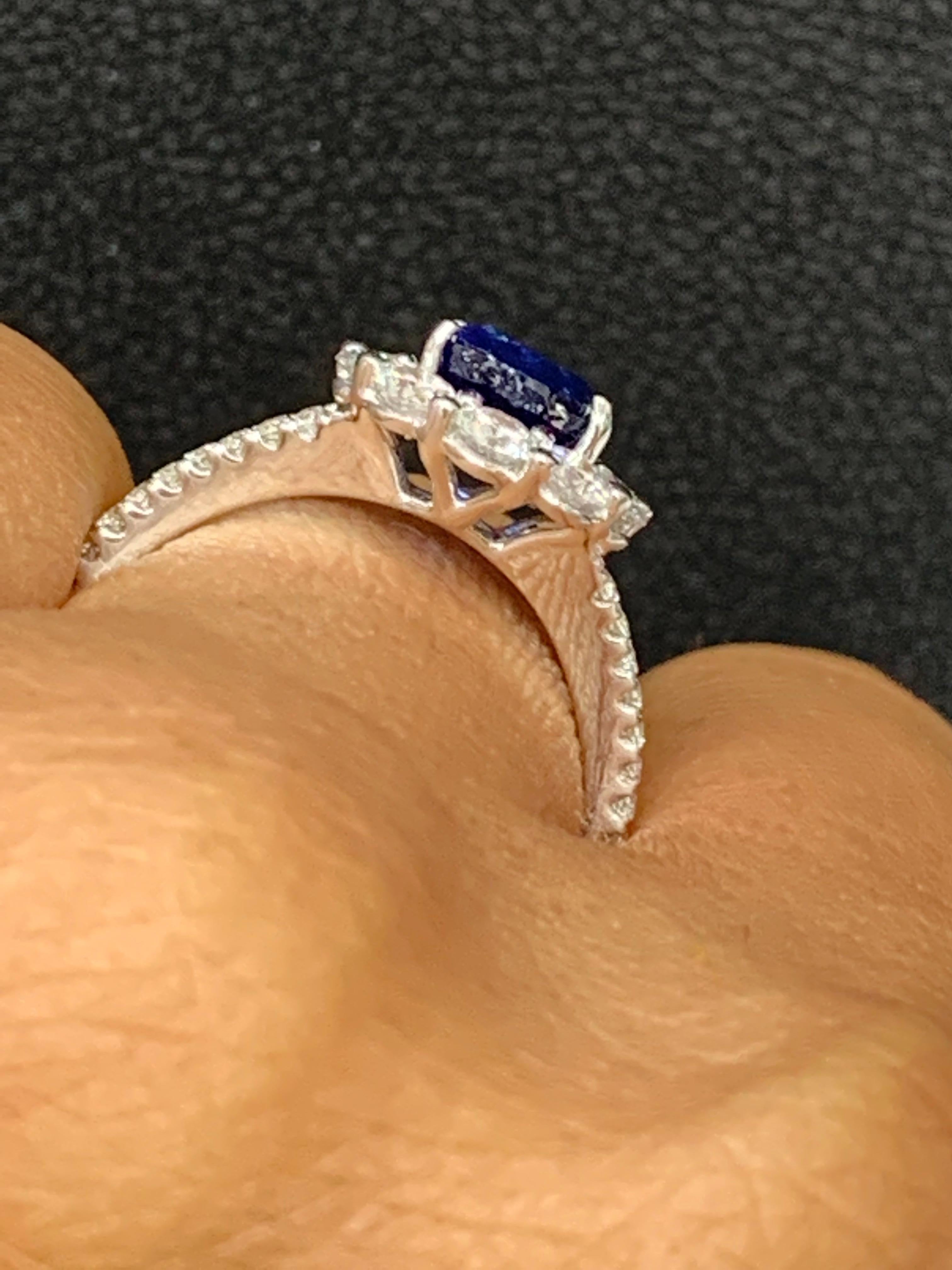 2.01 Carat Oval Shape Blue Sapphire and Diamond Flower Ring in 18K White Gold For Sale 1