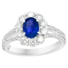 2.01 Carat Oval Shape Blue Sapphire and Diamond Flower Ring in 18K White Gold