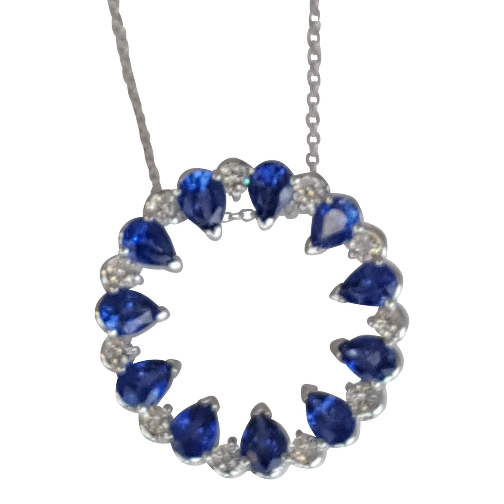 This beautiful sapphire pendant features eleven pear shaped blue sapphires alternating with eleven round white diamonds, to form a round ring. The total sapphire weight is 2.01 carats, and the total diamond weight 0.25 carats.

Set in 18k