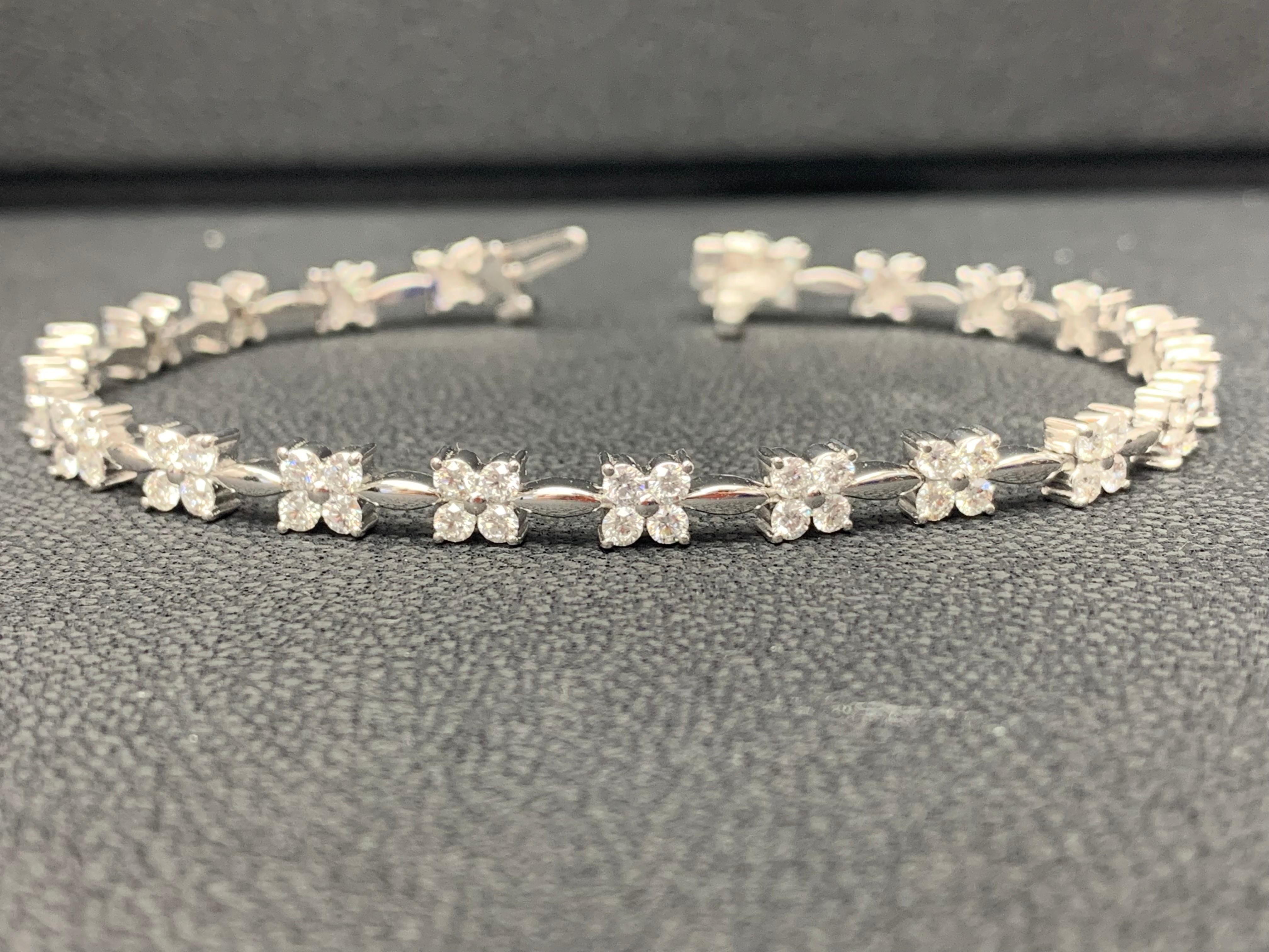 A classic and simple tennis bracelet style featuring a row of round brilliant diamonds weighing 2.01 carats total. Set in a polished 14k white gold mounting. 
All diamonds are GH color SI1 Clarity.
Available in Rose and White as well.
Style