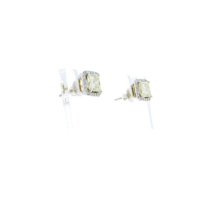 2.01 Carat Total Fancy Yellow Princess Cut Diamond Stud Earrings In New Condition In Chicago, IL