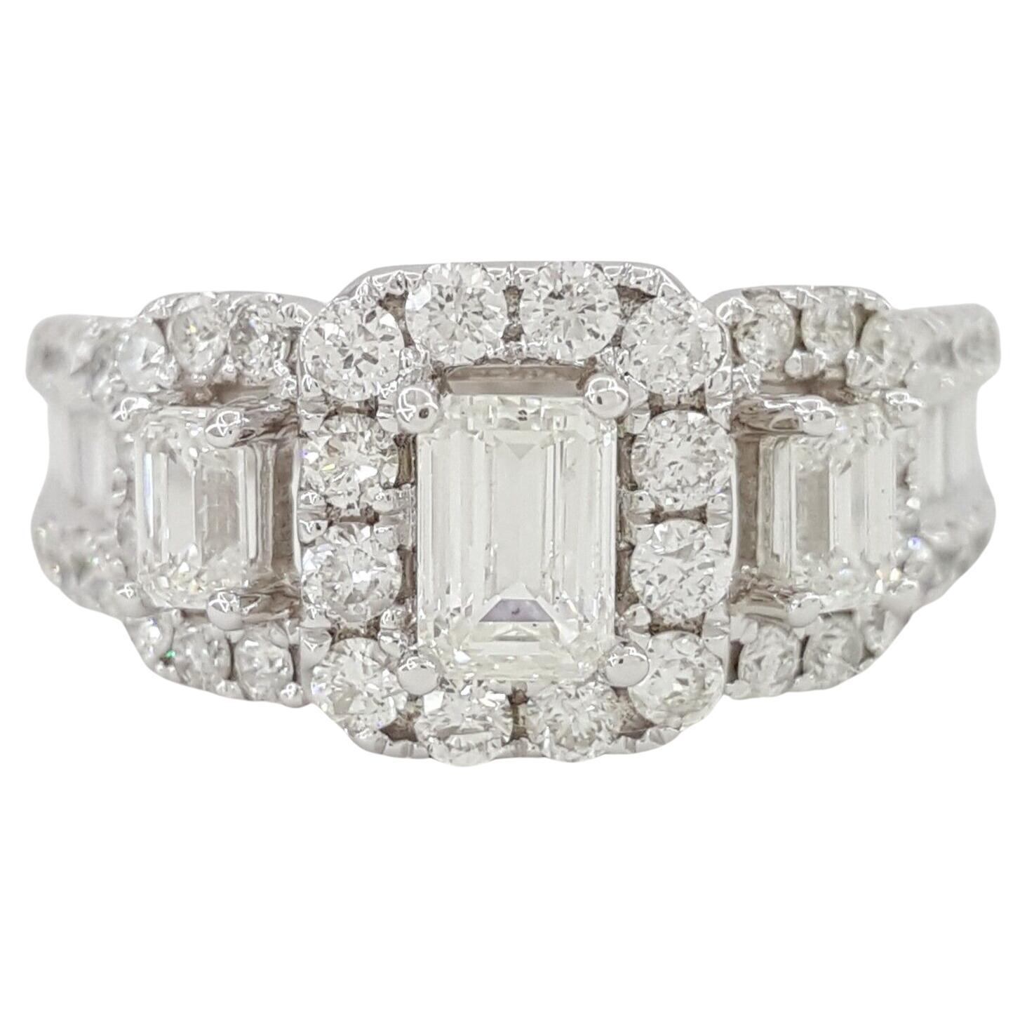2.01 ct total weight Emerald Cut Diamond Three Stone Halo Engagement Ring In New Condition For Sale In Chicago, IL