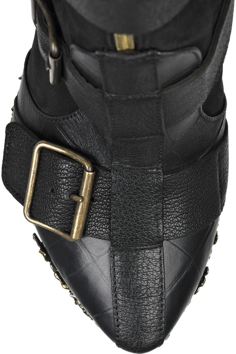 Black 2010 ALEXANDER MCQUEEN Floral-engraved leather boots