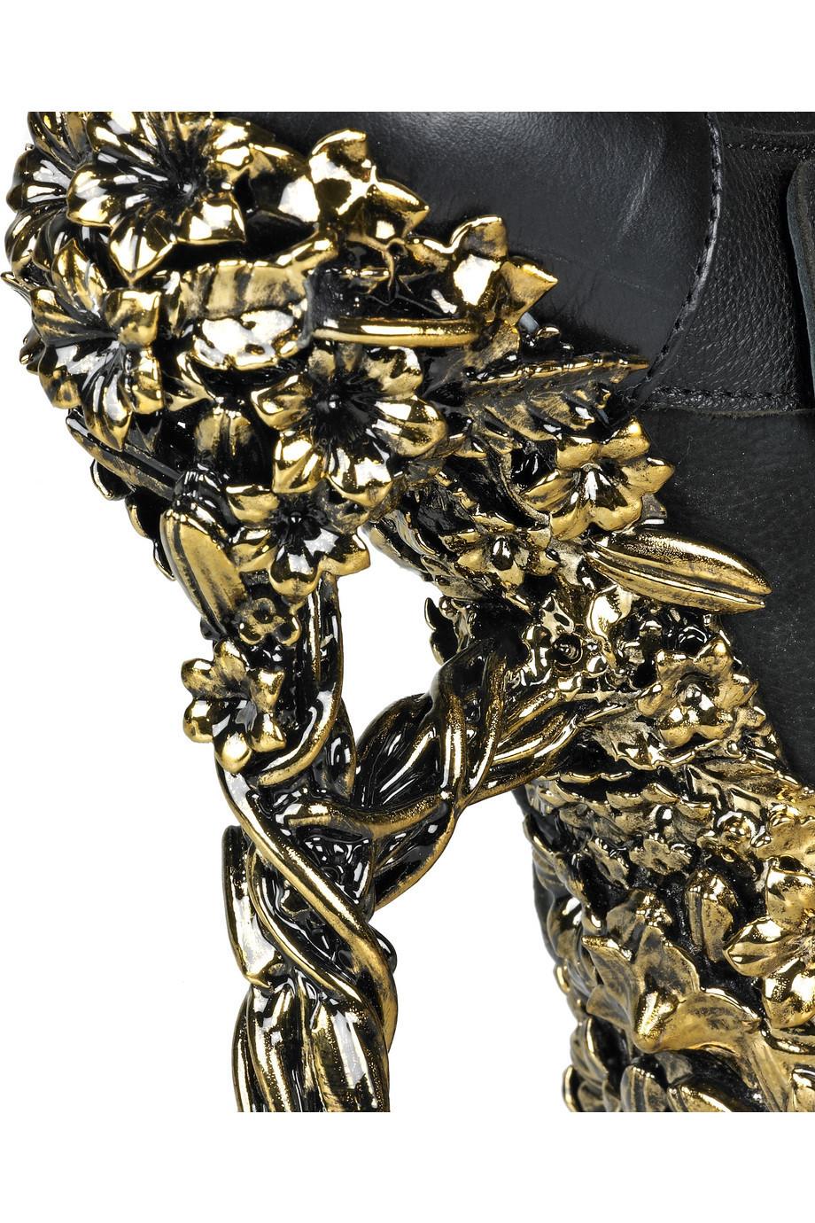 2010 ALEXANDER MCQUEEN Floral-engraved leather boots In Excellent Condition In Montgomery, TX