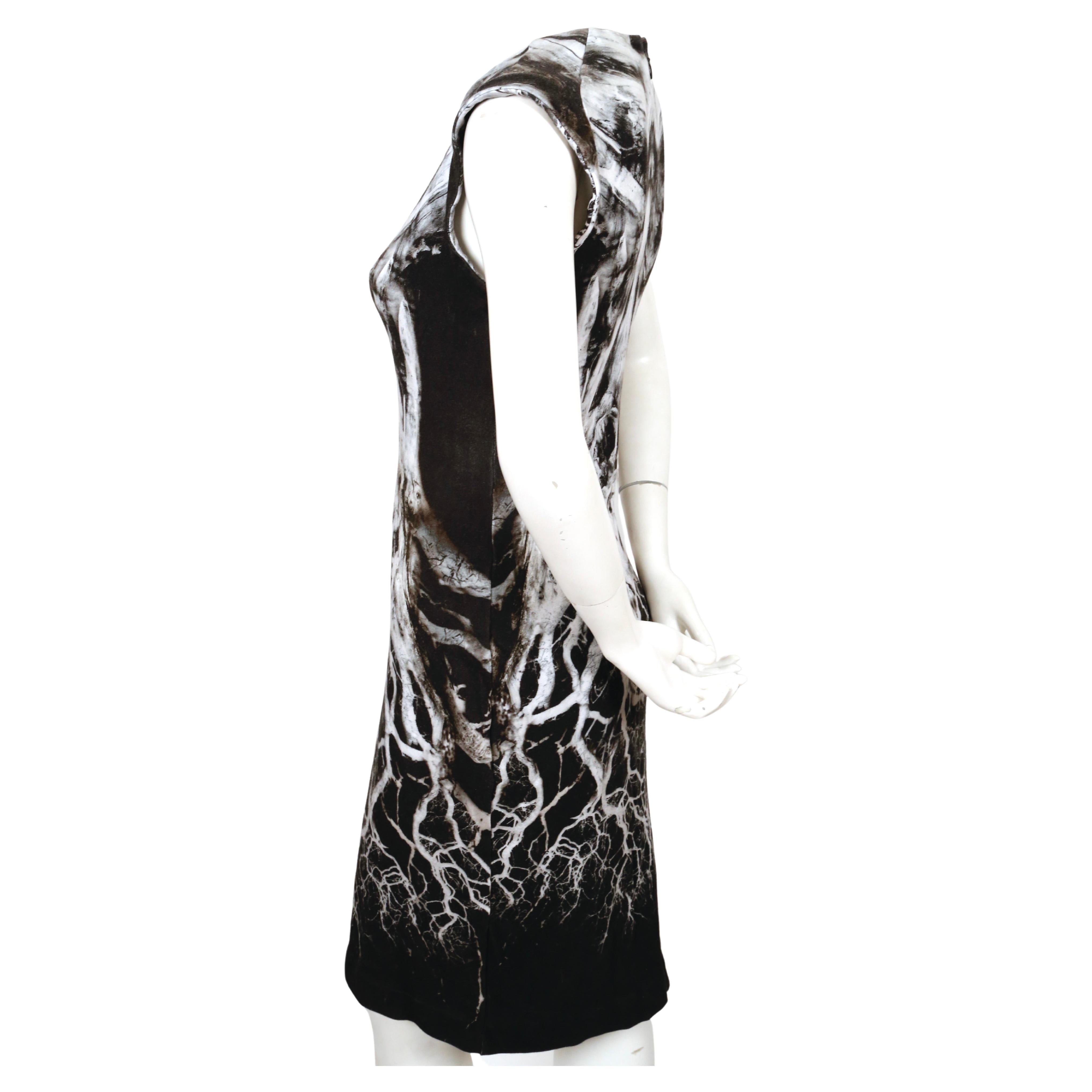Very rare screen-printed 'skeleton' dress created by Alexander McQueen dating to 2010. Italian size 42 best fits a size 6 to 8. Approximate measurements:  bust 34
