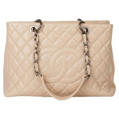 Used 2010 Beige Quilted Caviar Leather Grand Shopping Tote GST