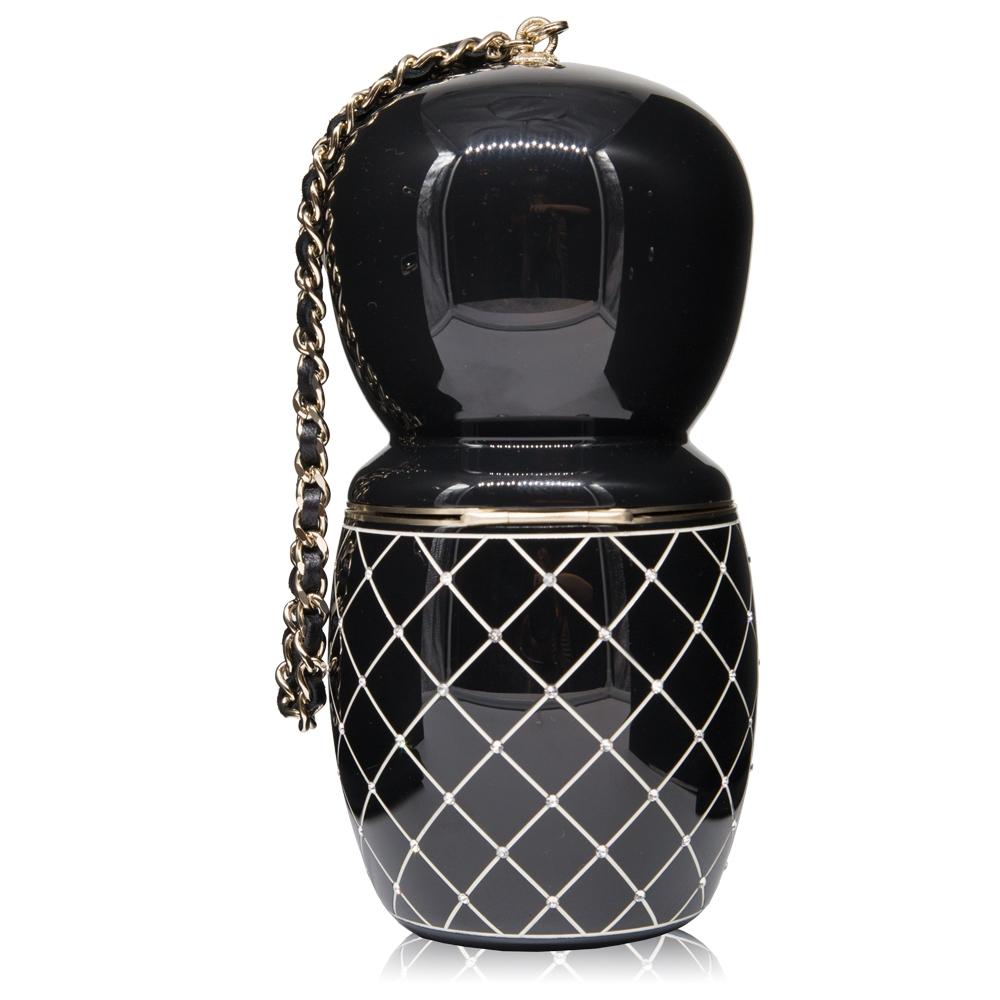 A must-have for every Chanel collector, this incredibly chic piece has been meticulously crafted from black resin in Italy. A Limited edition piece, this pre-owned Paris-Shanghai Lucite Matryoshka Evening Bag is from the Pre-Fall 2012 Métiers d'Art